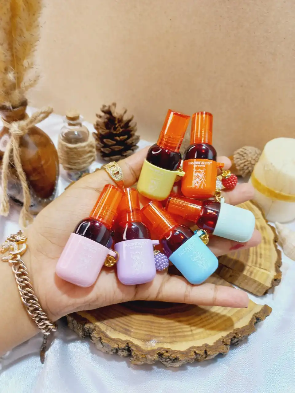 تینت لب فاور بیوتی طرح بطری مروارید دار کد LG3097