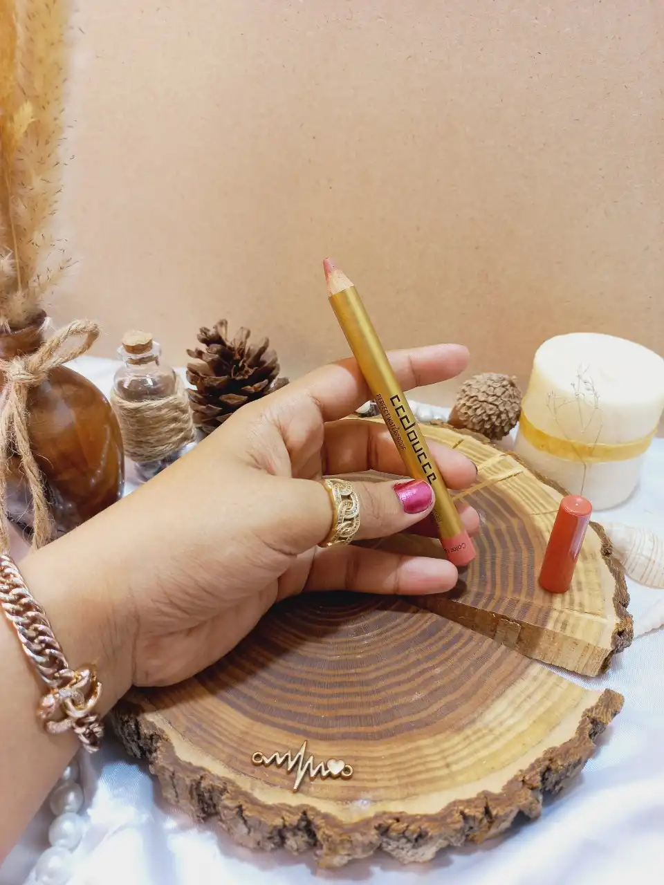 رژ لب مدادی پوکه طلایی دوسه DOUCCE