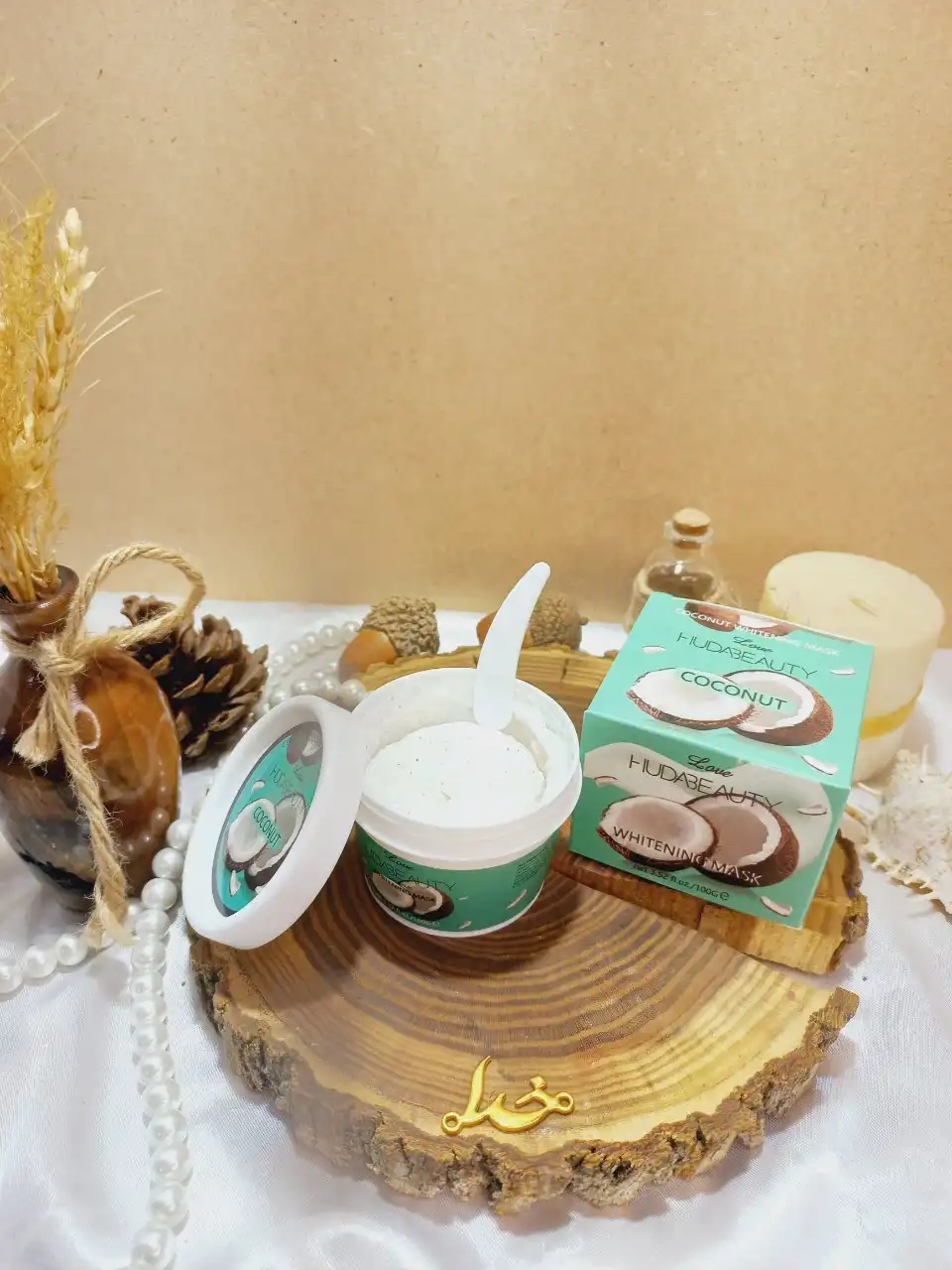 اسکراب شنی صورت و بدن رایحه نارگیلی هدی بیوتی HUDABEAUTY کد 826020