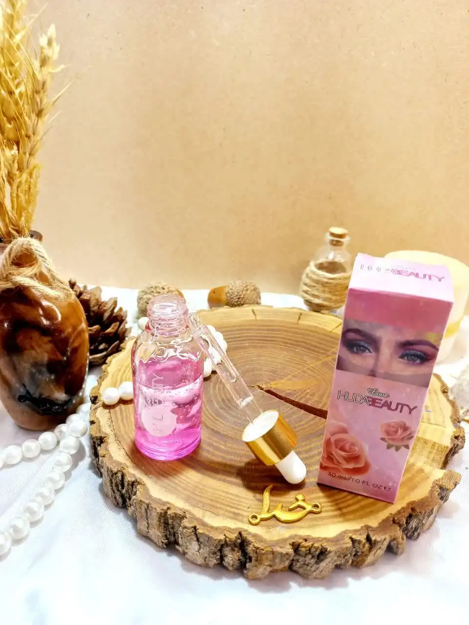 سرم صورت روشن کننده ضد لک و ابرسان هدی بیوتی ( صورتی )