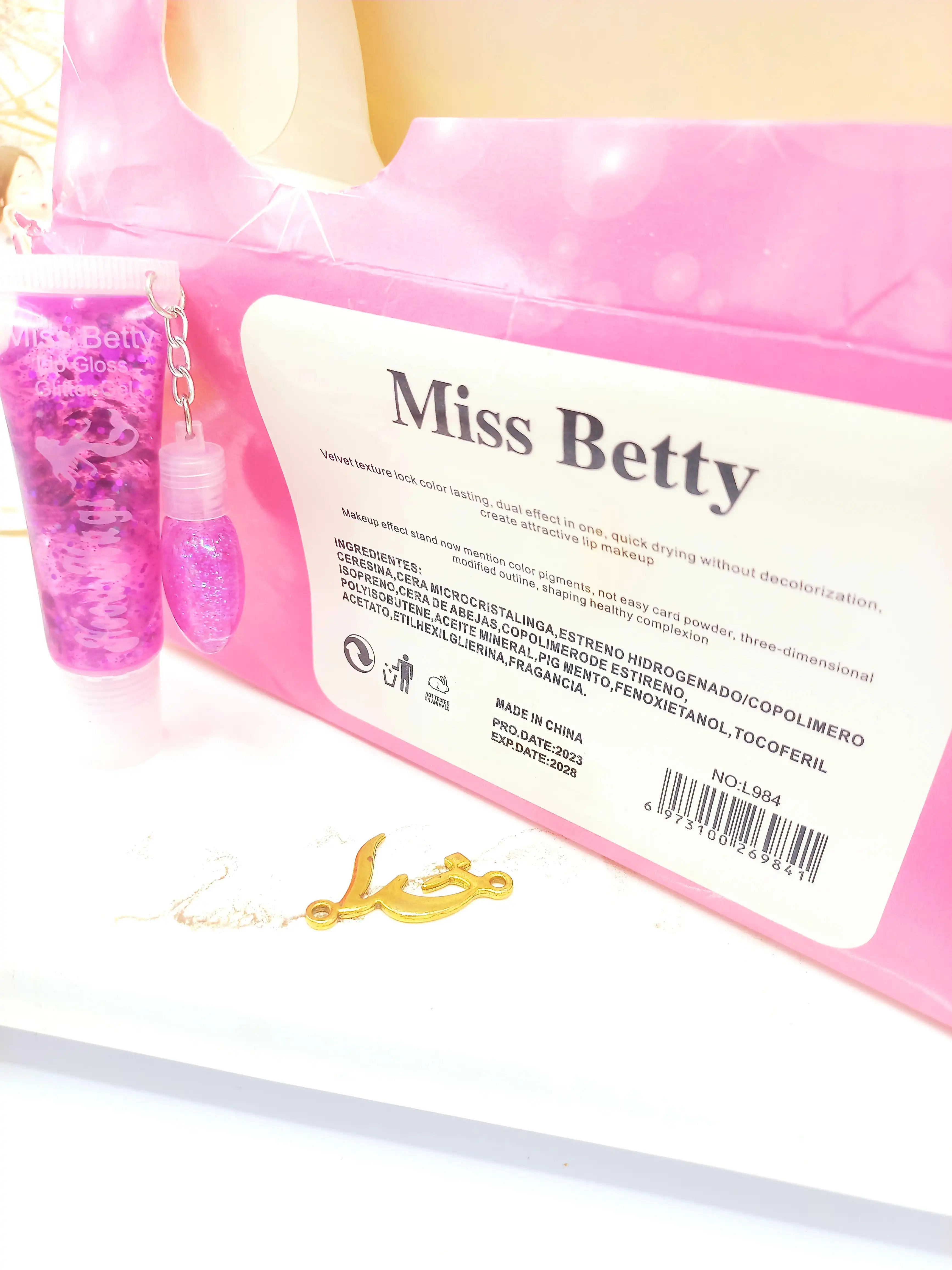 برق لب حرارتی و لیپ گلاس شاینی دو قلو  Miss Betty کد L984