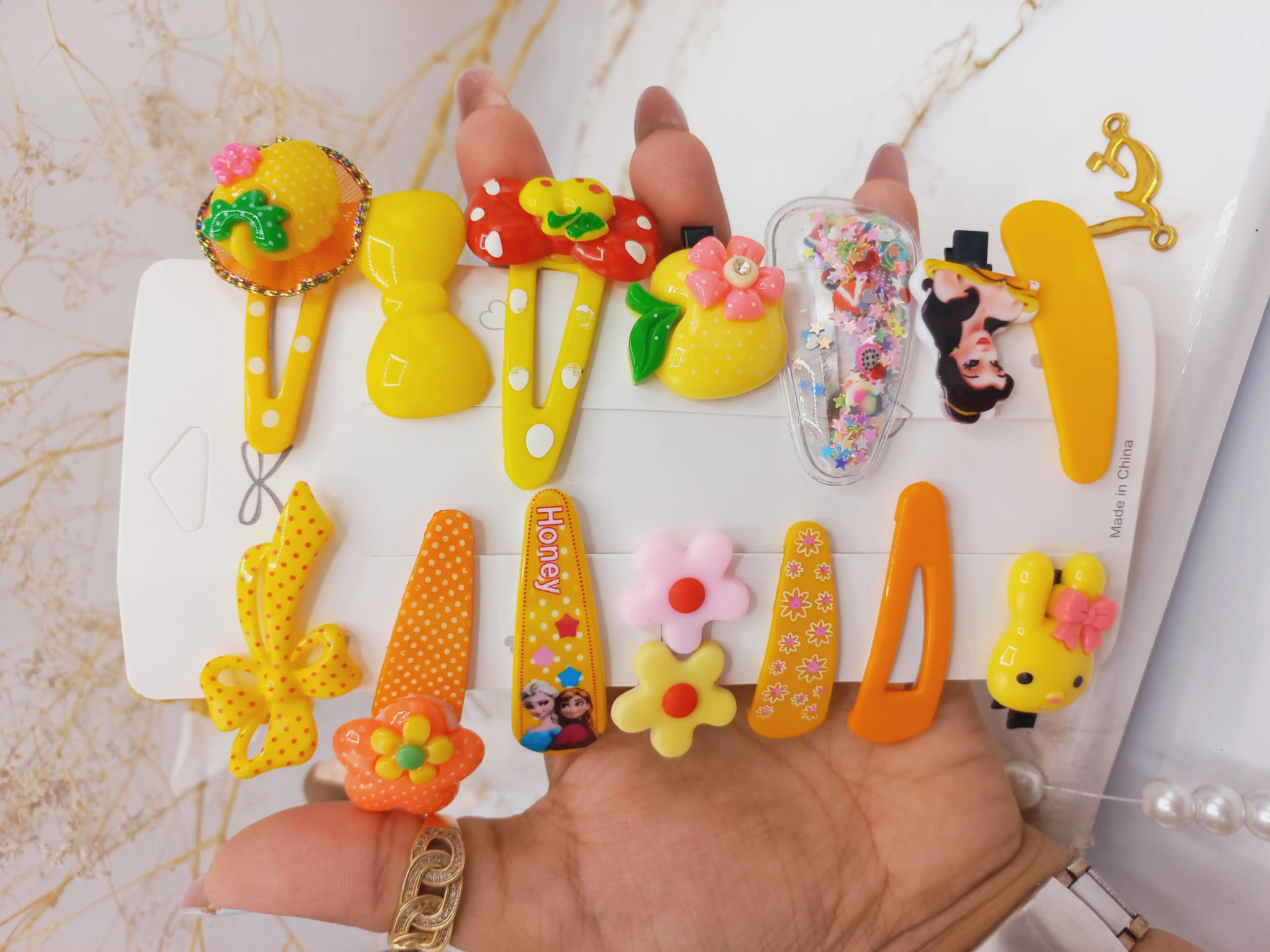 پک گیره و پنس مو دخترانه عروسکی زرد 14 عددی