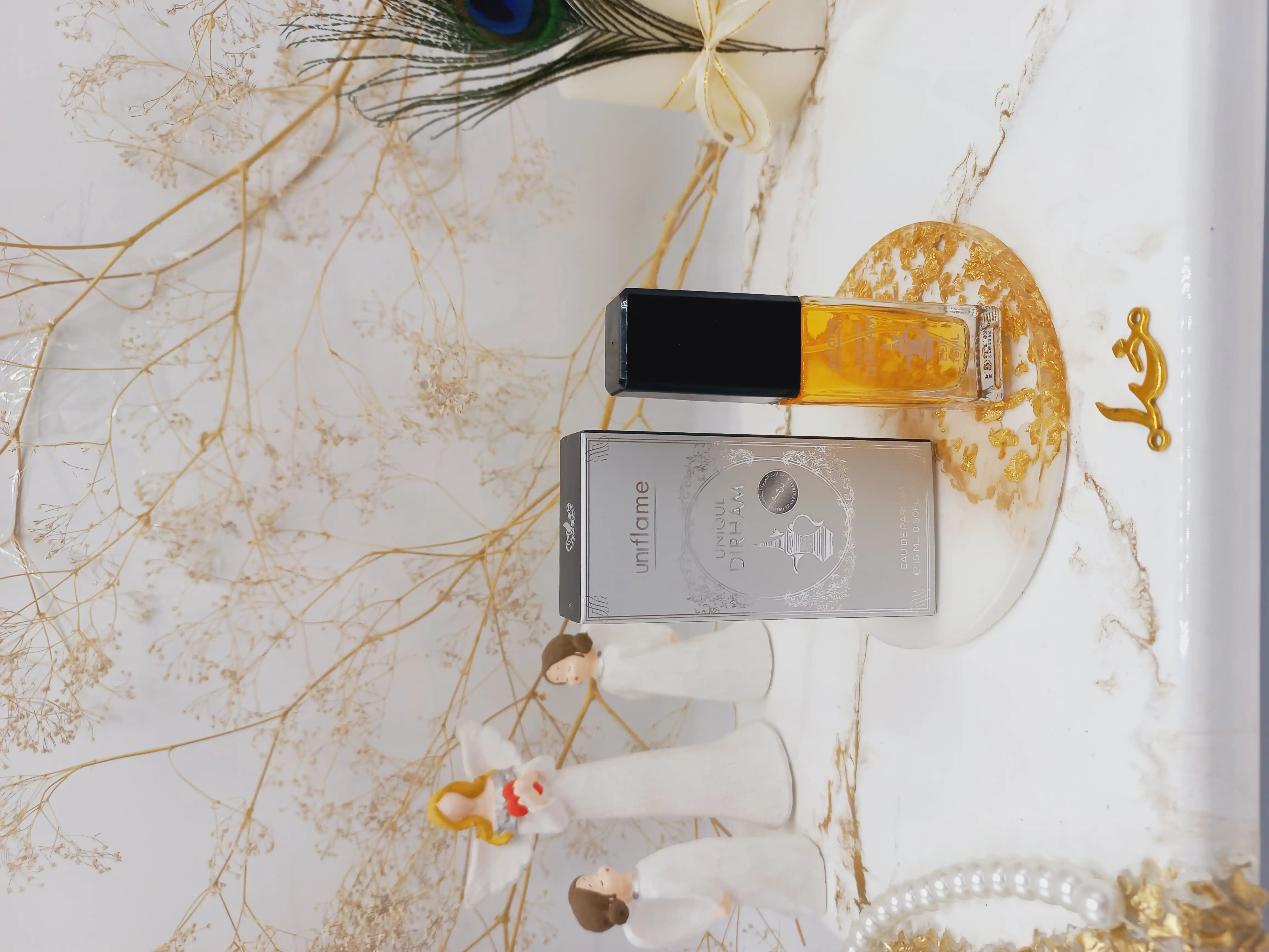 ادکلن درهم UNIQUE DIRHAM برند Uniflame حجم 15 میل