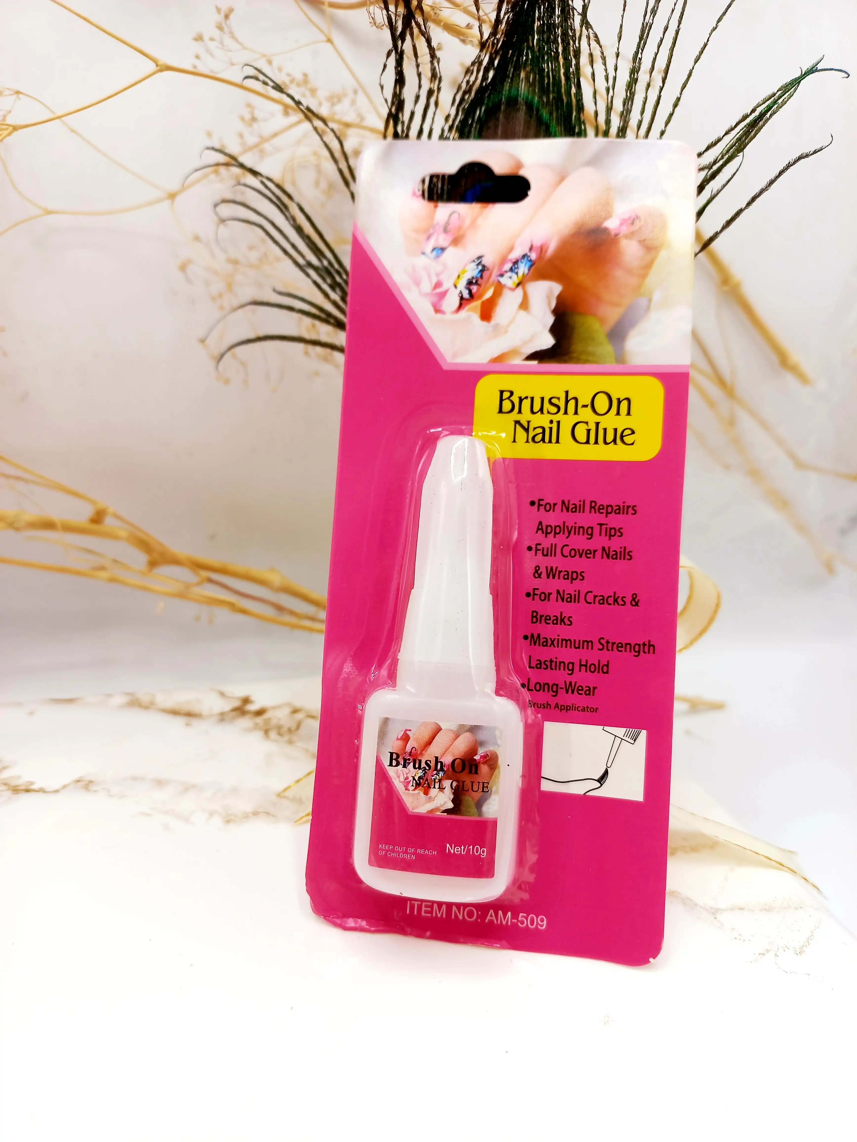چسپ ناخن Brush On Nail Glue (کارتن صورتی) کد AM509