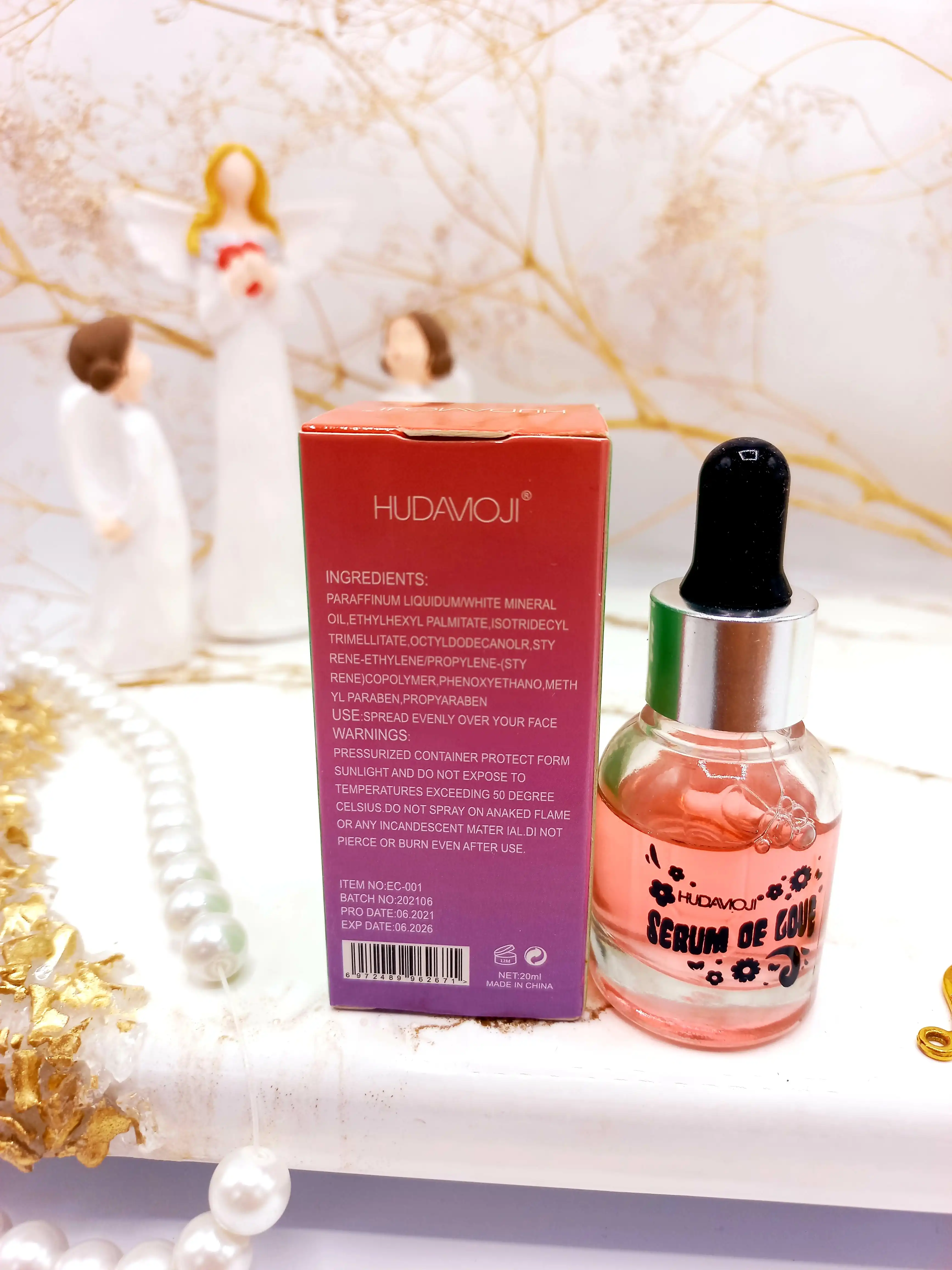سرم روشن کننده پوست مدل گل رز هدی موجی HUDA MOJI حجم 20 ml کدEC001
