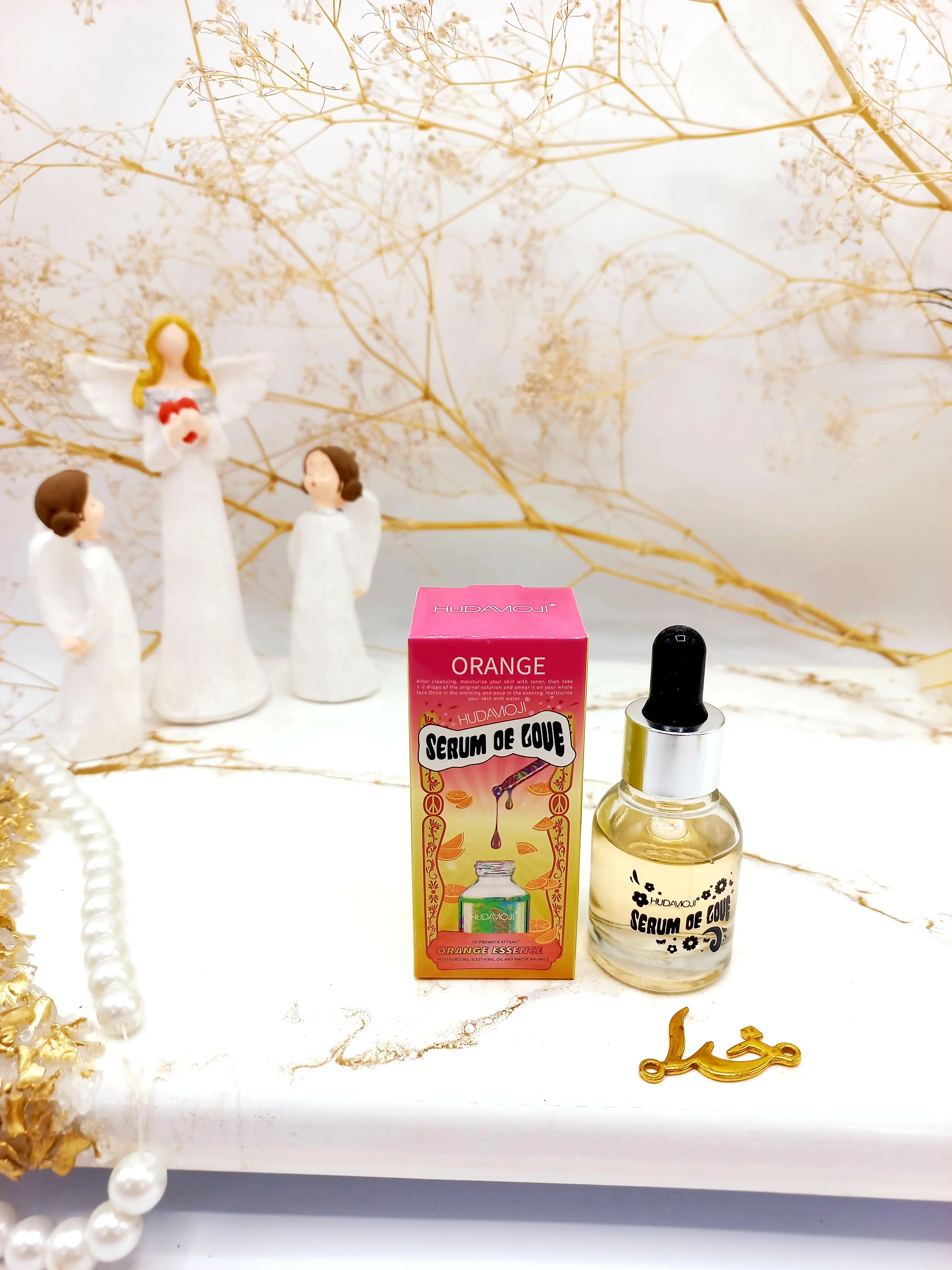 سرم روشن کننده پوست مدل پرتقال هدی موجی HUDA MOJI حجم 20 ml کدEC001