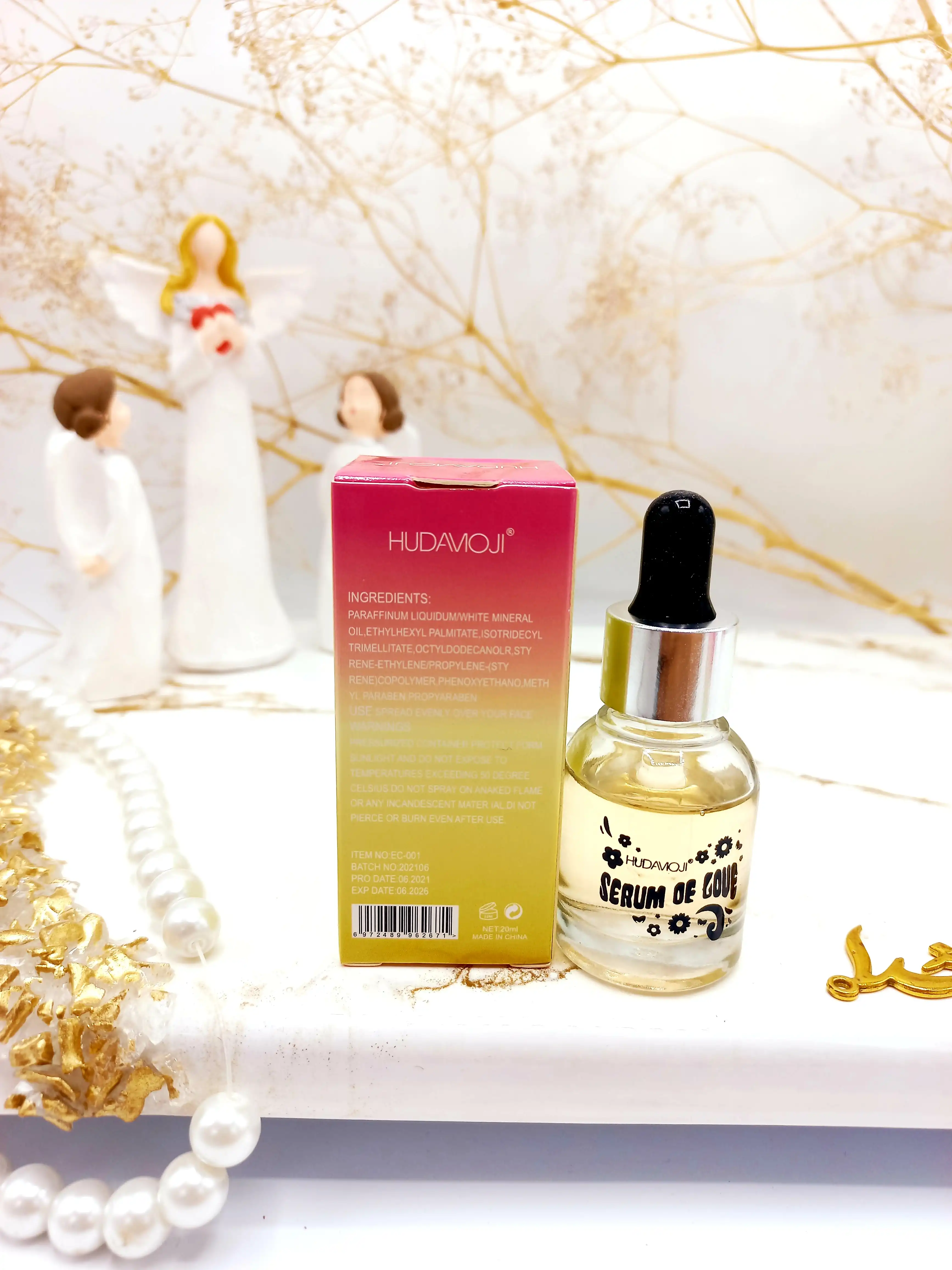 سرم روشن کننده پوست مدل پرتقال هدی موجی HUDA MOJI حجم 20 ml کدEC001