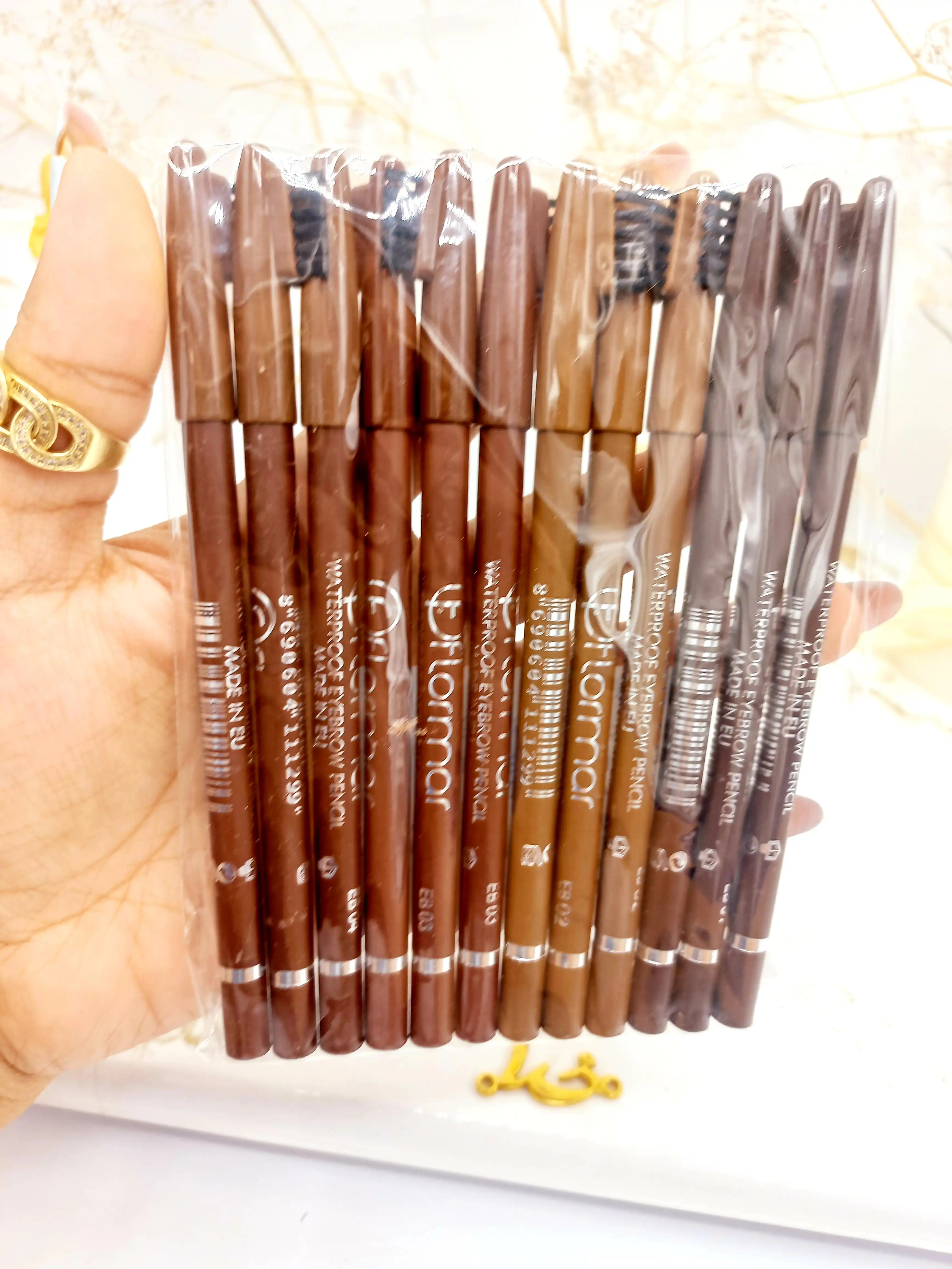 مداد ابرو ضد آب فلورمار شانه دار کد 1299