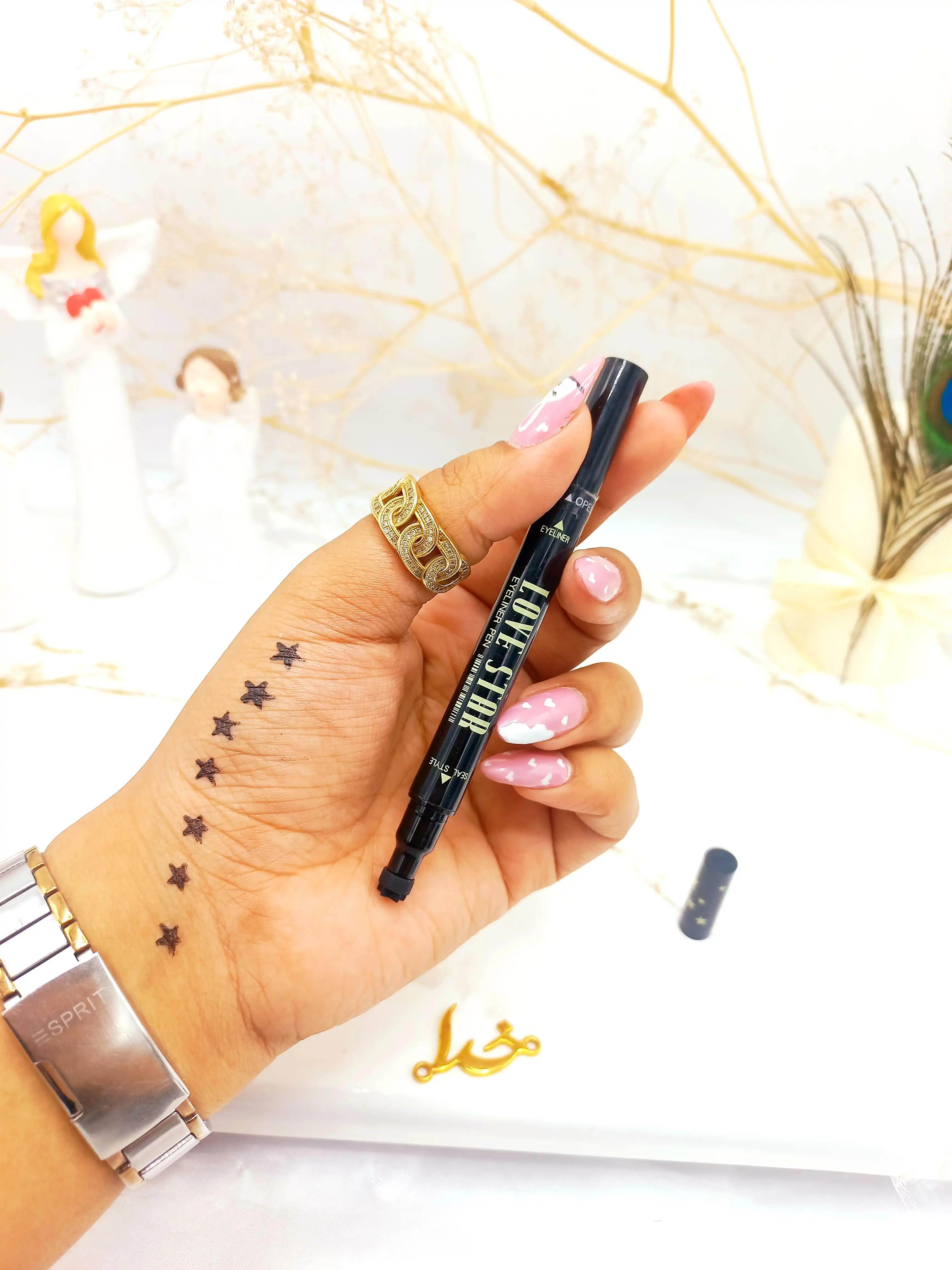 خط چشم مشکی ماژیکی  و دوسر طرح دار ستاره ای LOVE STAR