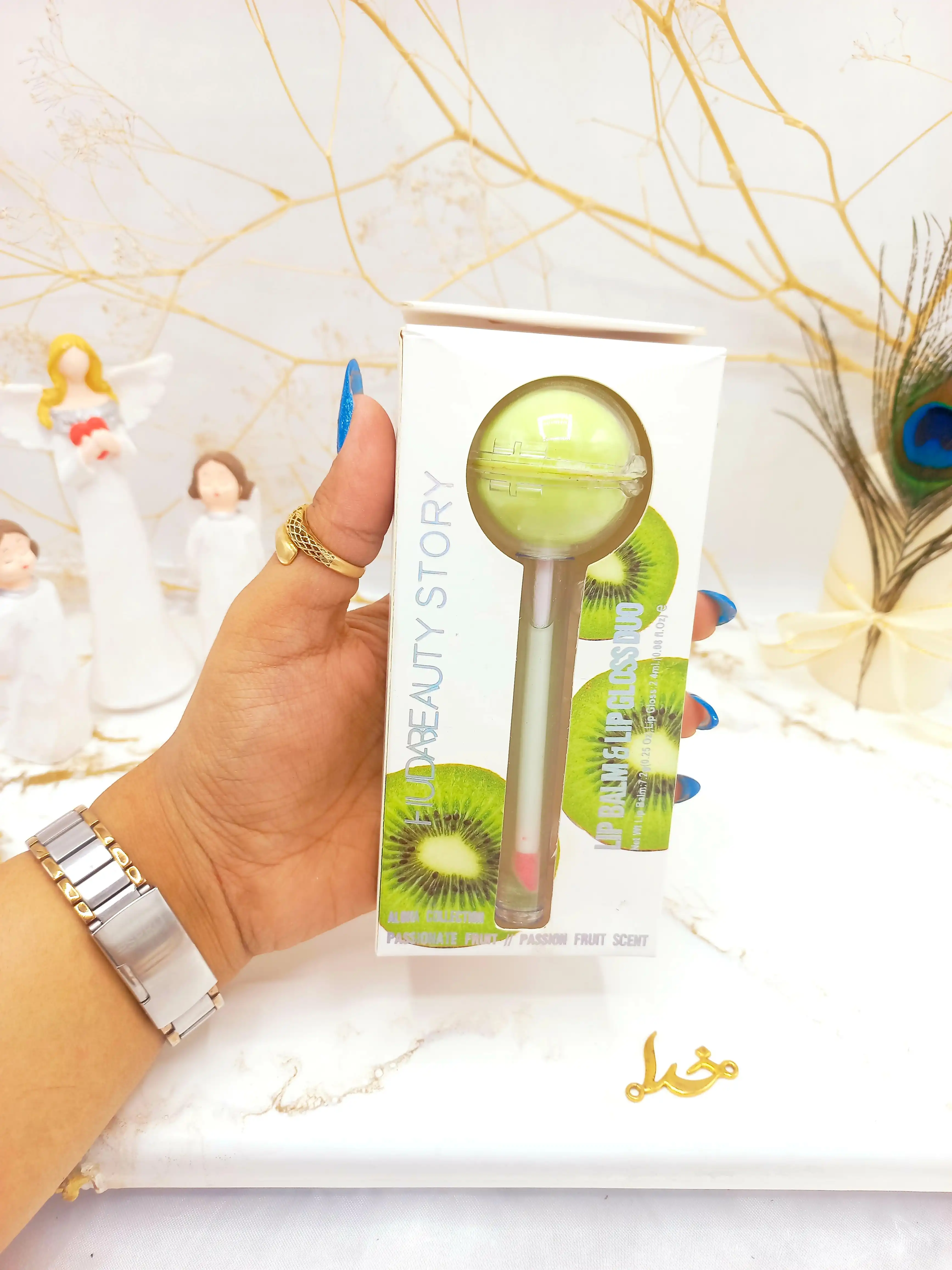 برق لب و بالم لب آبنباتی کیوی هدا بیوتی استوری HUDA BEAUTY STORY