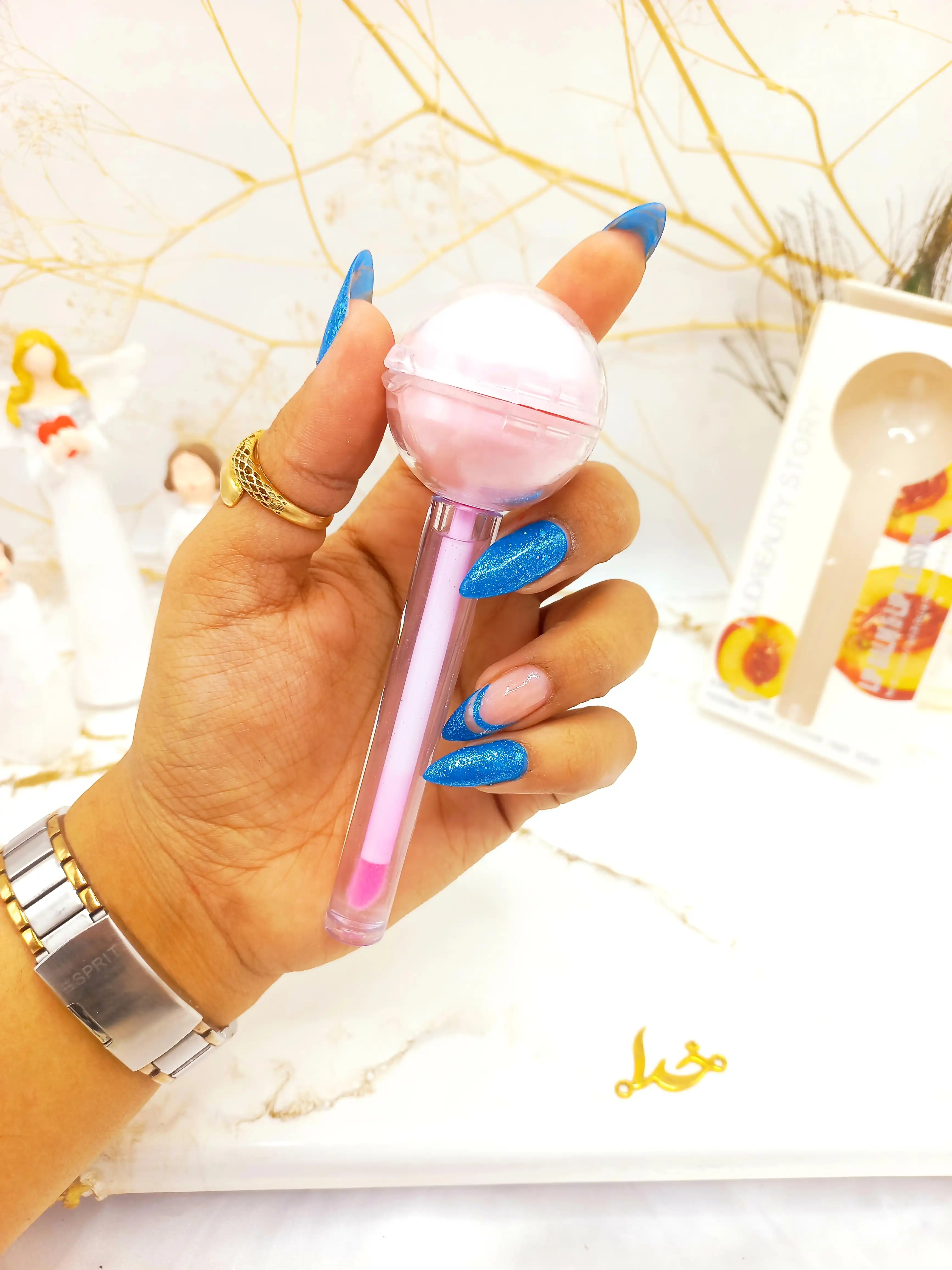 برق لب و بالم لب آبنباتی شلیل هدا بیوتی استوری HUDA BEAUTY STORY