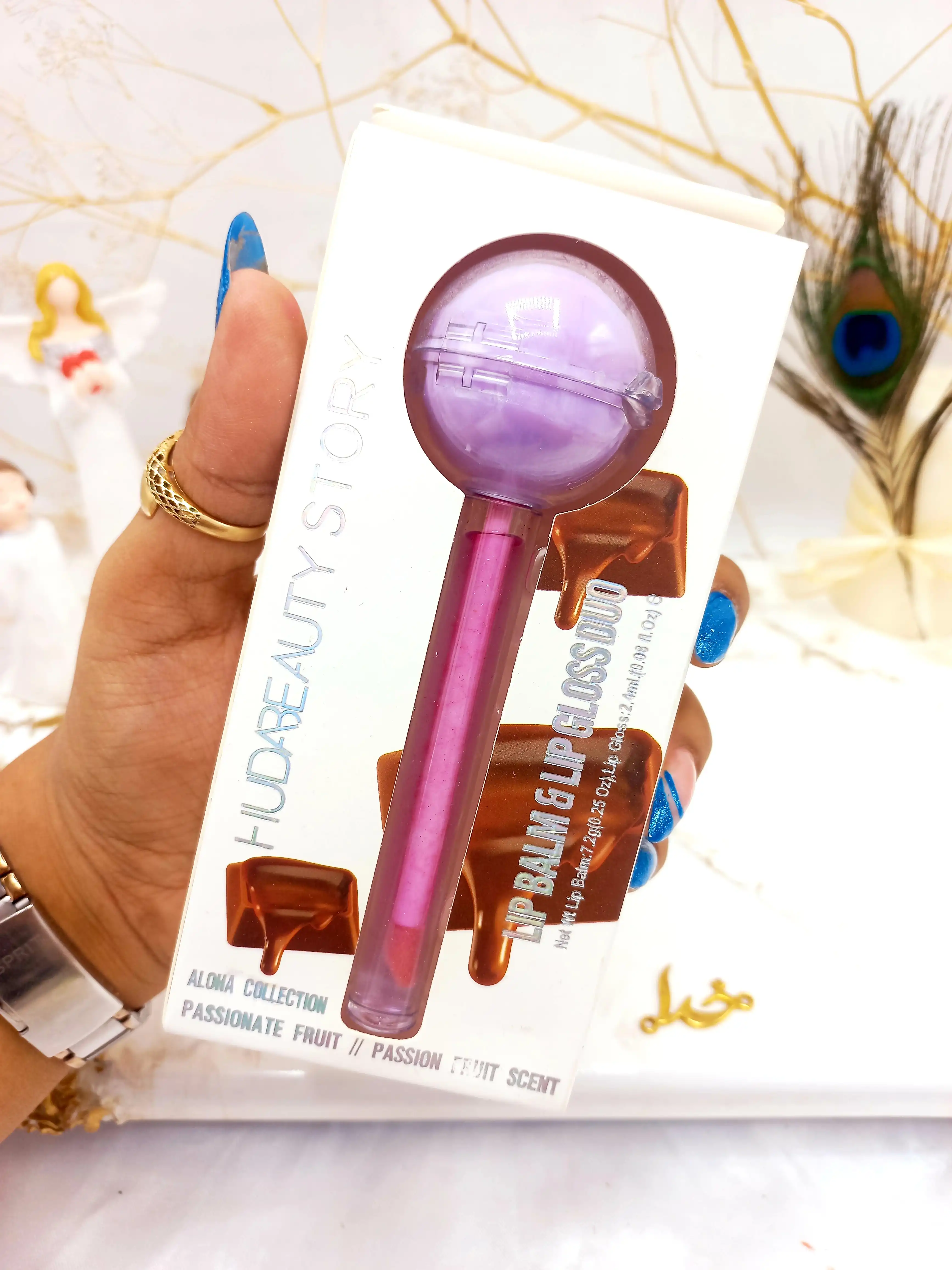 برق لب و بالم لب آبنباتی کاکائو هدا بیوتی استوری HUDA BEAUTY STORY