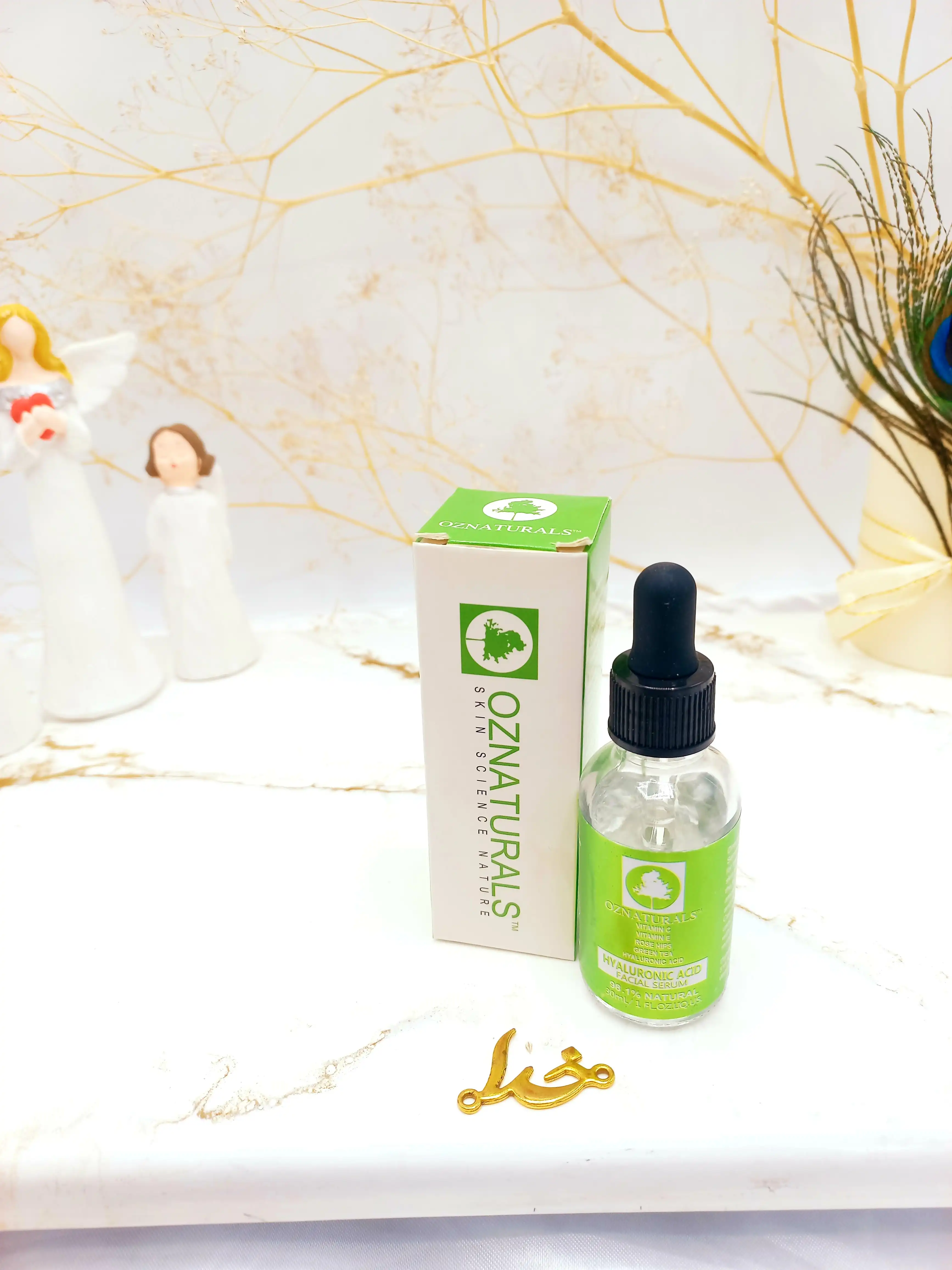 سرم مراقبتی ویتامین سی و هیالورونیک اسید OZNATURALS