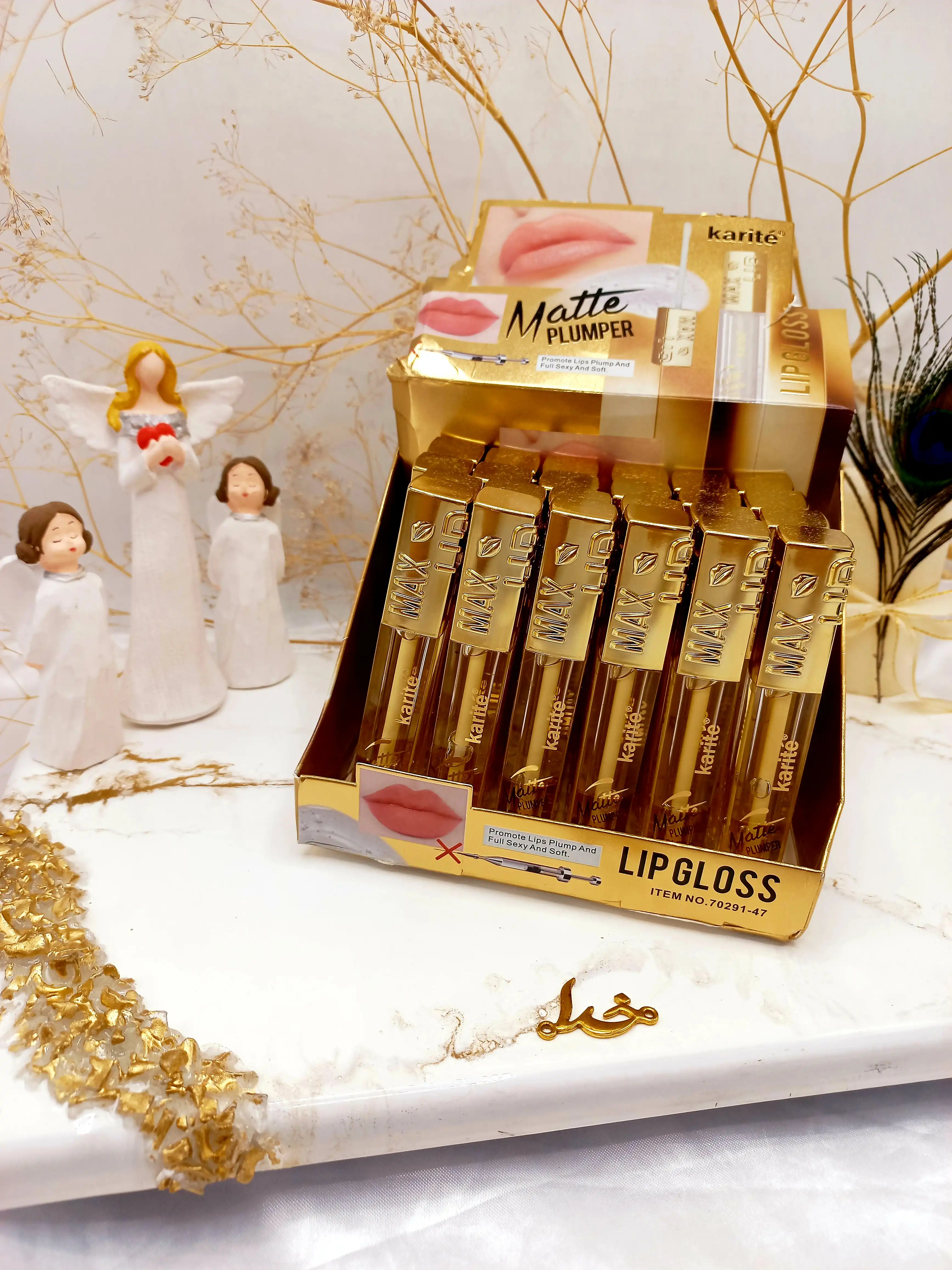 لیپ گلاس و حجم دهنده لب کاریته karite کد 70291