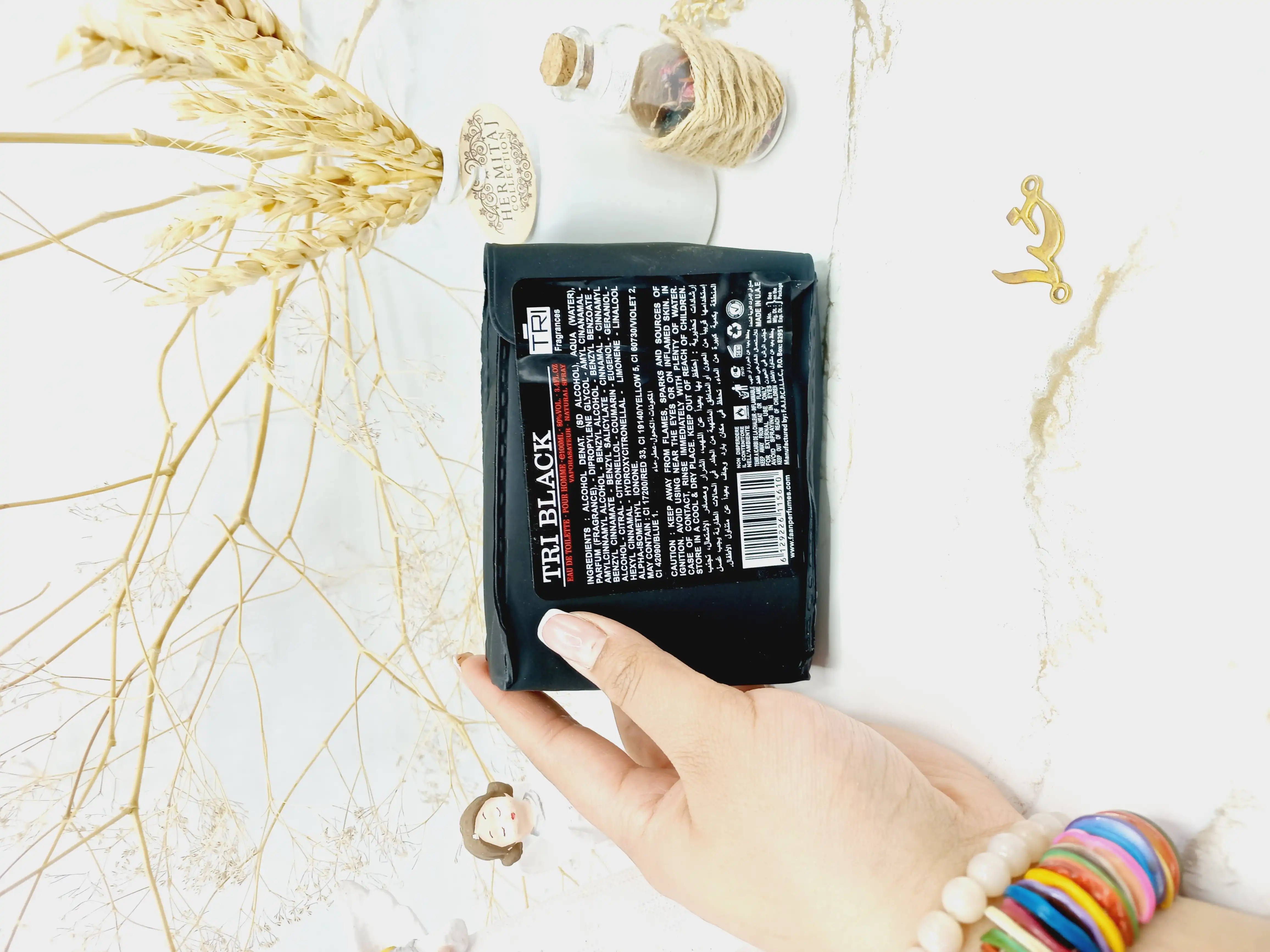 ادکلن تری بلک TRI Black حجم 100 میلی لیتر اماراتی (کیف چرمی)