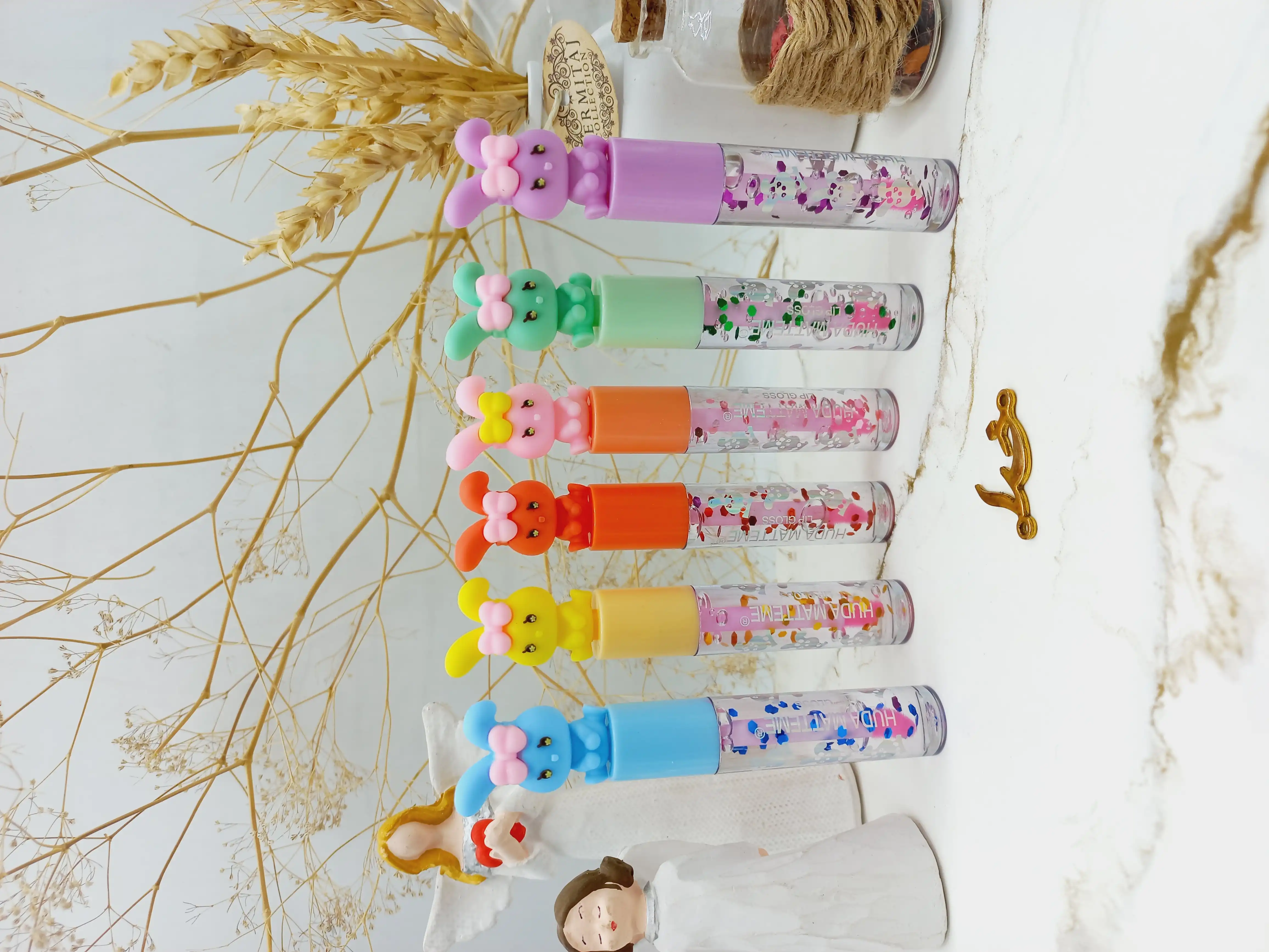 برق لب طرح بچه هدی مات می HUDA Matte Me کد X247