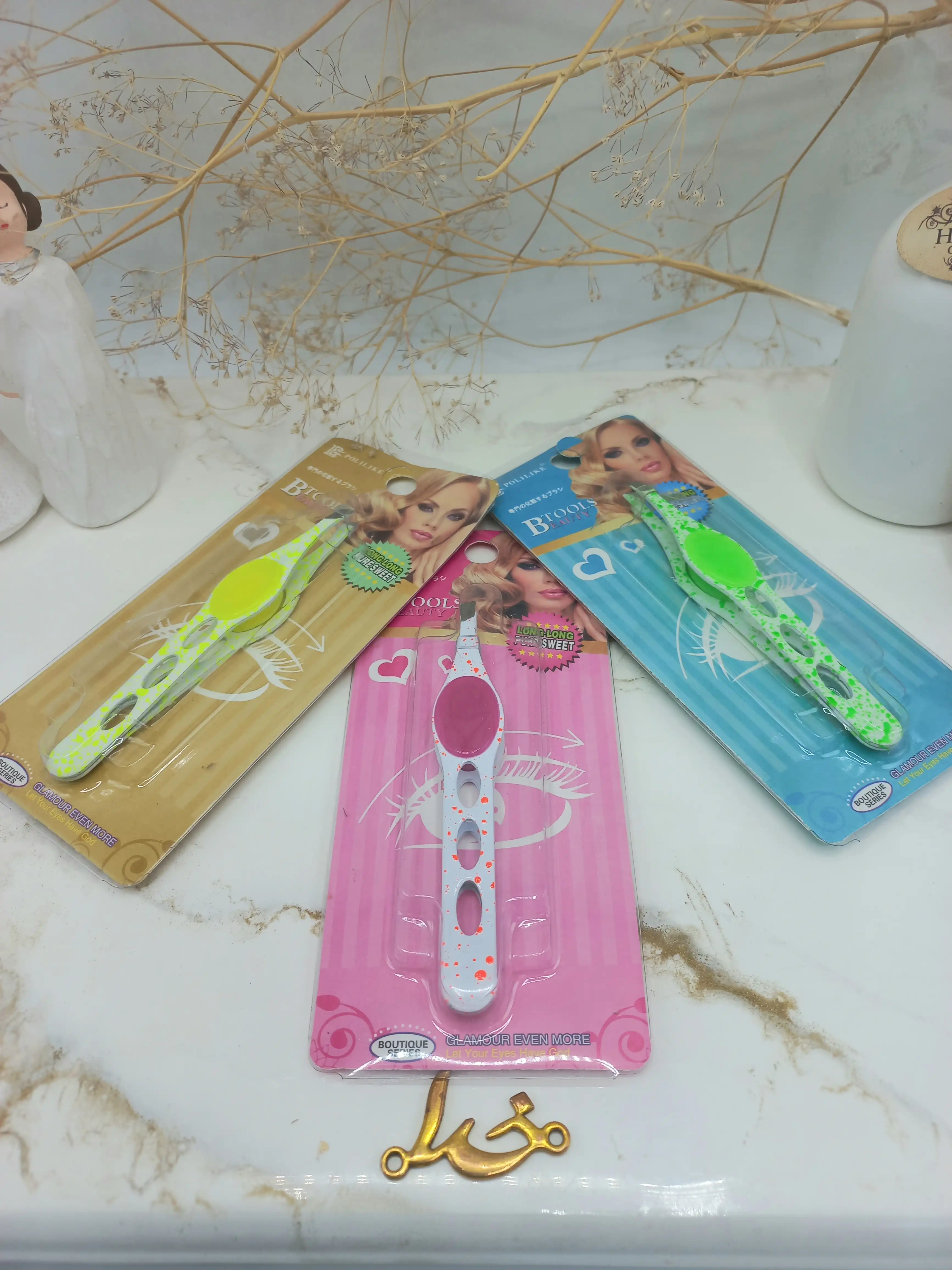 موچین ابرو دکمه دار طرح آبرنگی