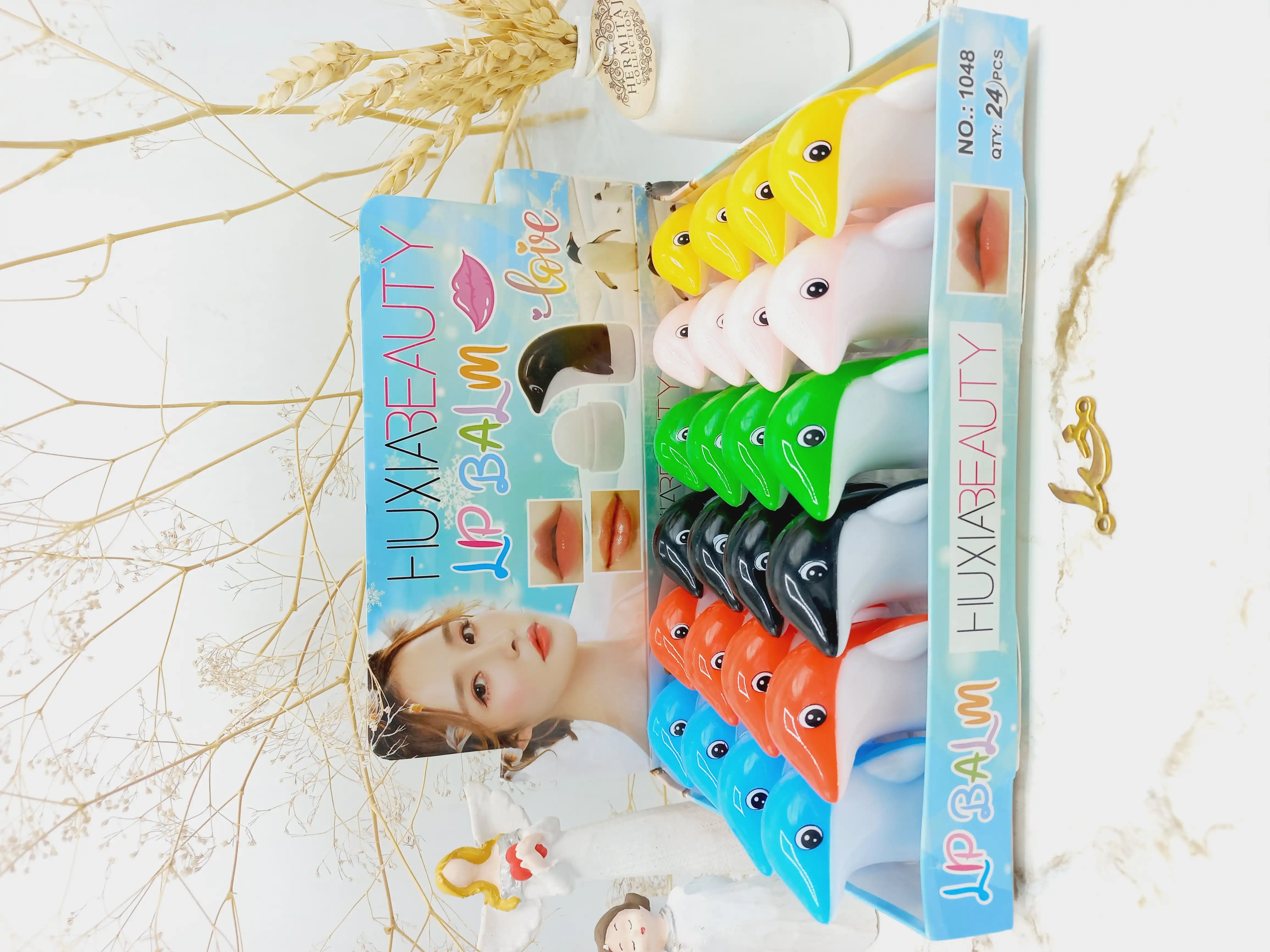 بالم لب طرح دلفین برند هوکسیا بیوتی HUXIA BEAUTY کد 1048