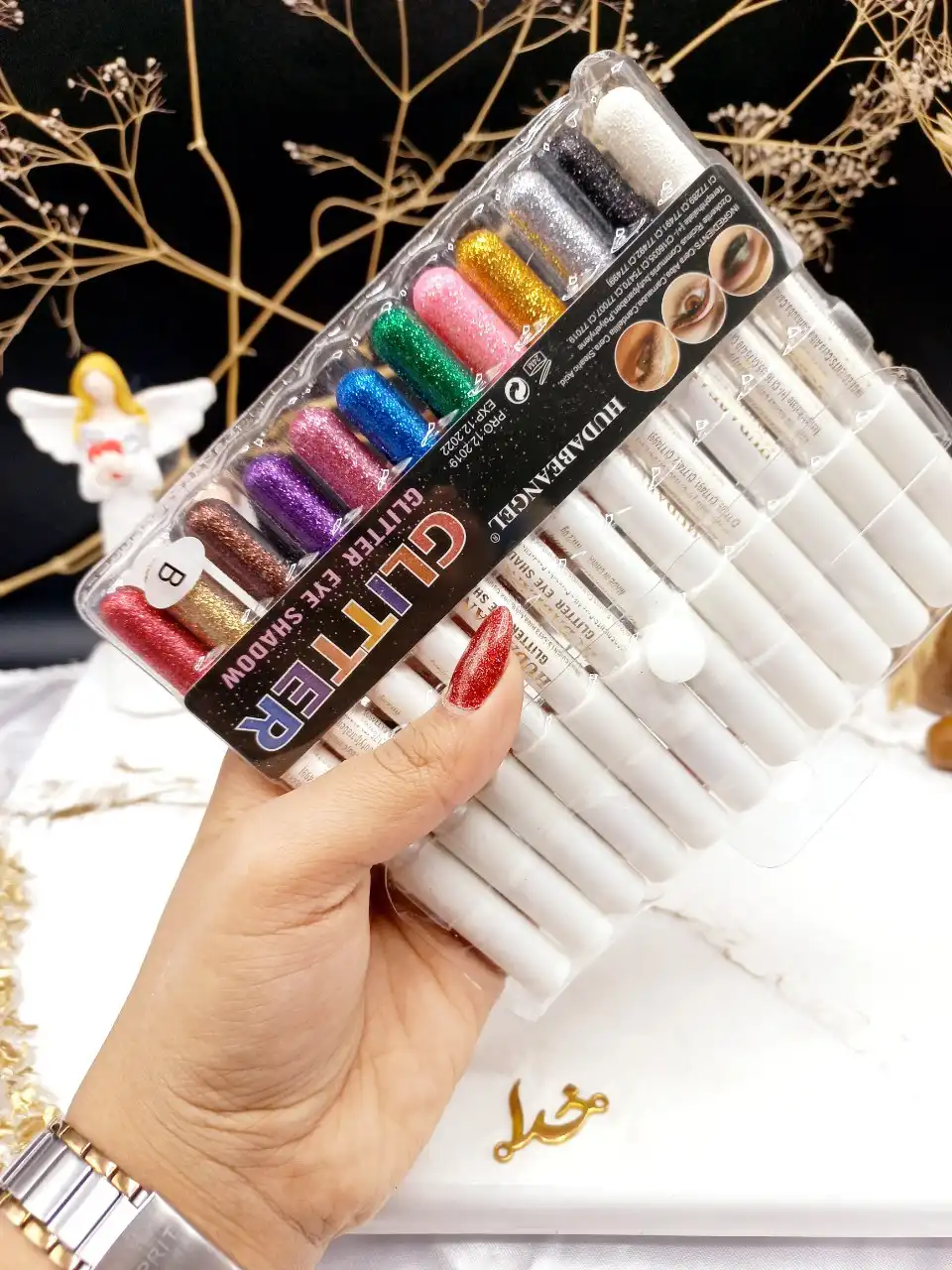 پک رژ مدادی ۱۲ عددی گلیتری برند هدی بانجل HUDABEANGEL پوکه سفید