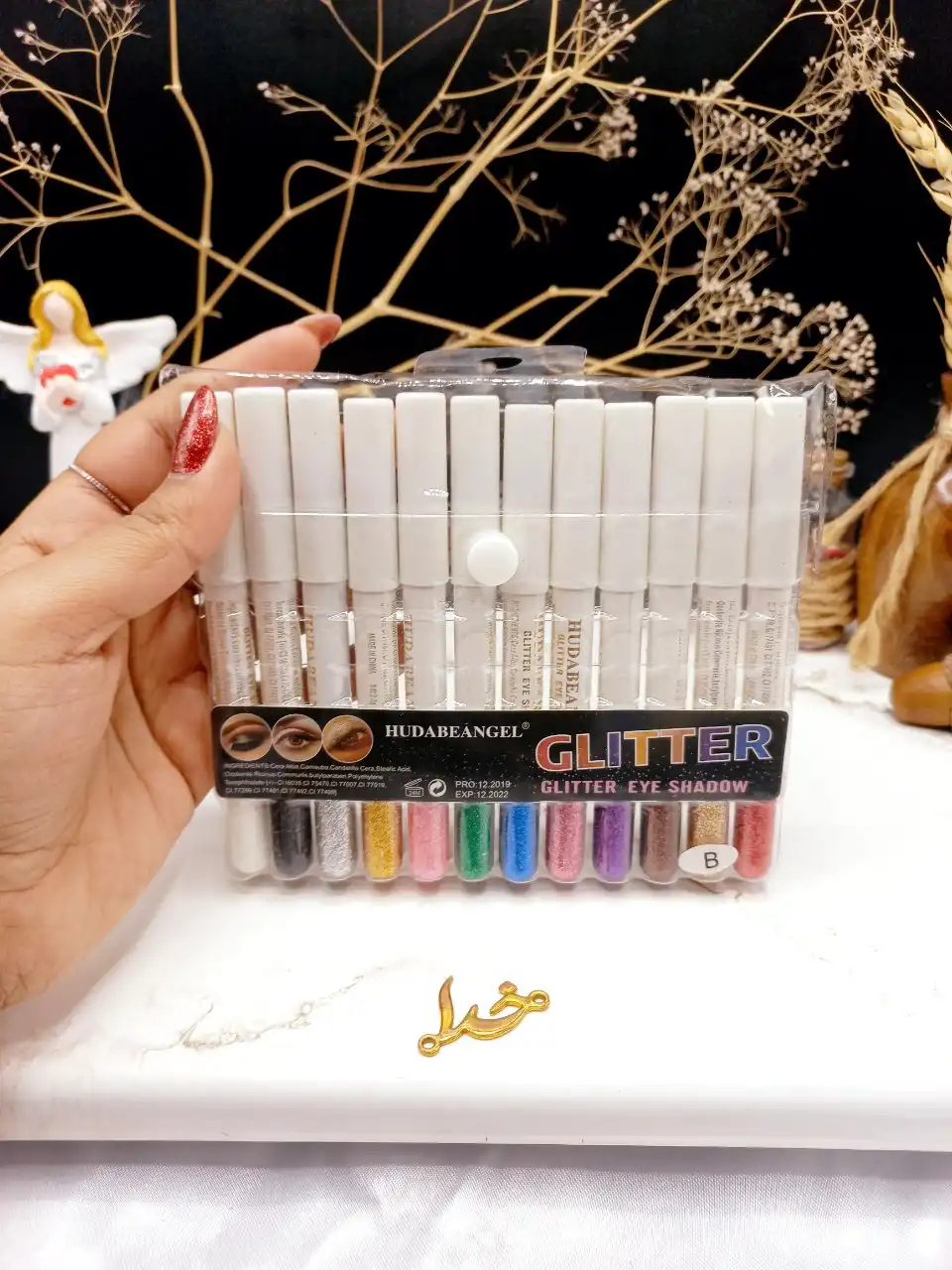 پک رژ مدادی ۱۲ عددی گلیتری برند هدی بانجل HUDABEANGEL پوکه سفید