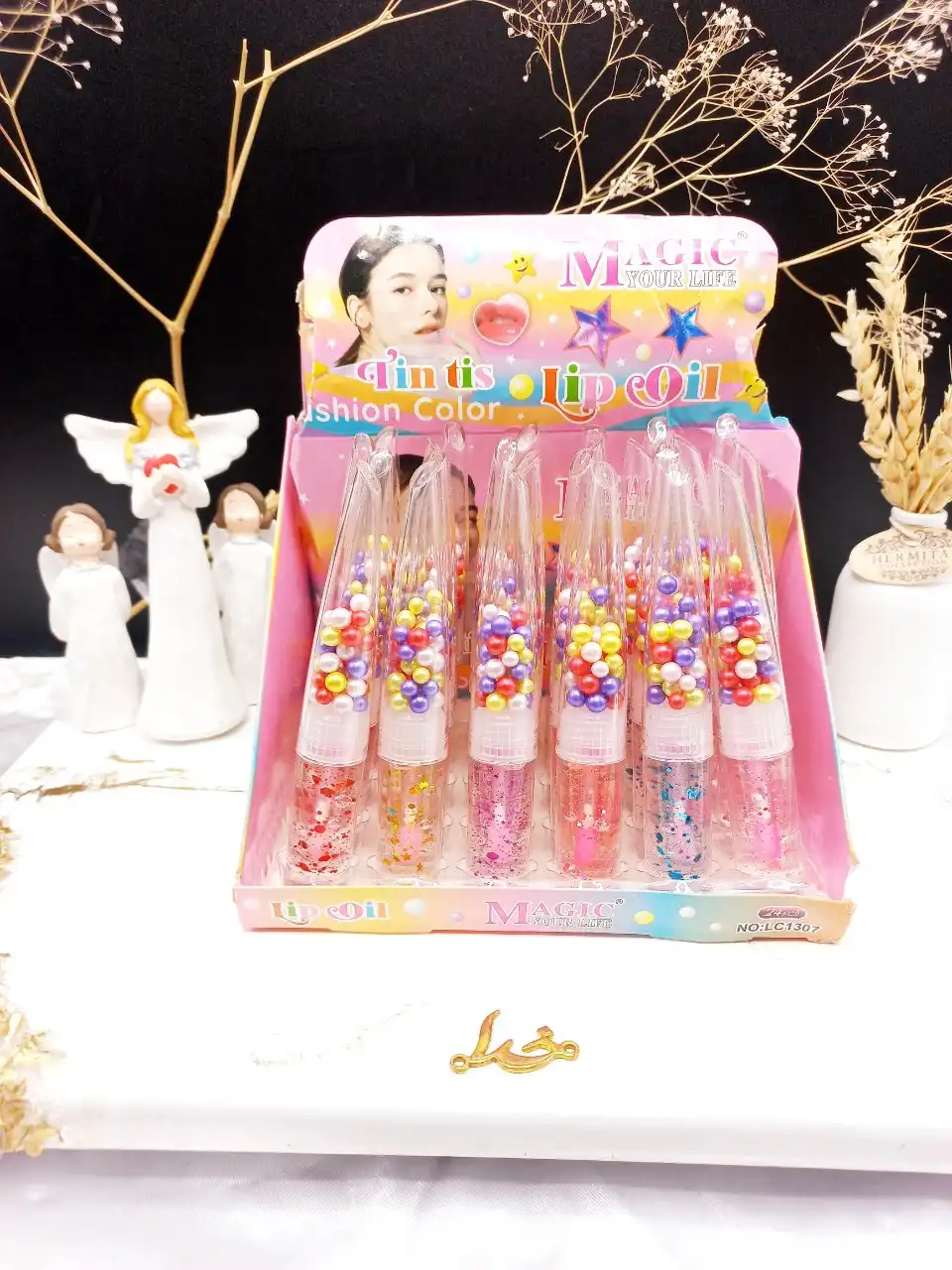 برق لب زیبای گلیتر دار توپی رنگی مجیک MAGIC  کد LC1307