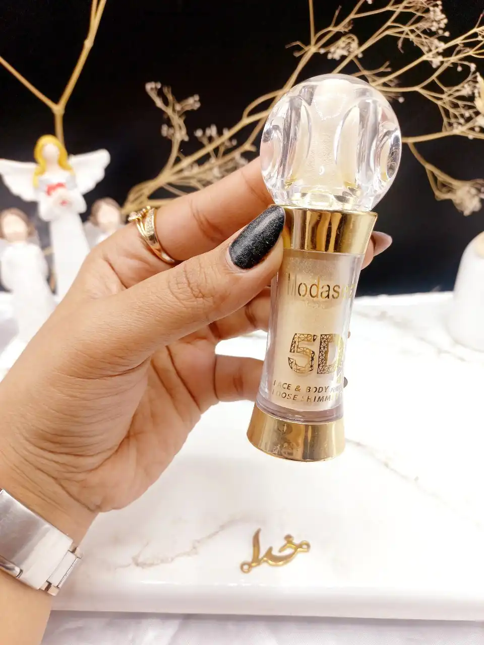 هایلایتر پودری صورت و بدن ضدآب مدا سکرت Modq Secret کد0005