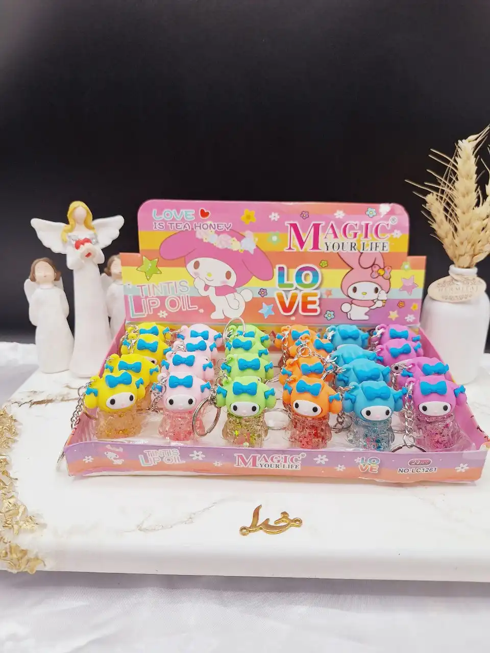 لیپ گلاس طرح فانتزی آویز دار مجیک MAGIC کد LC 1261