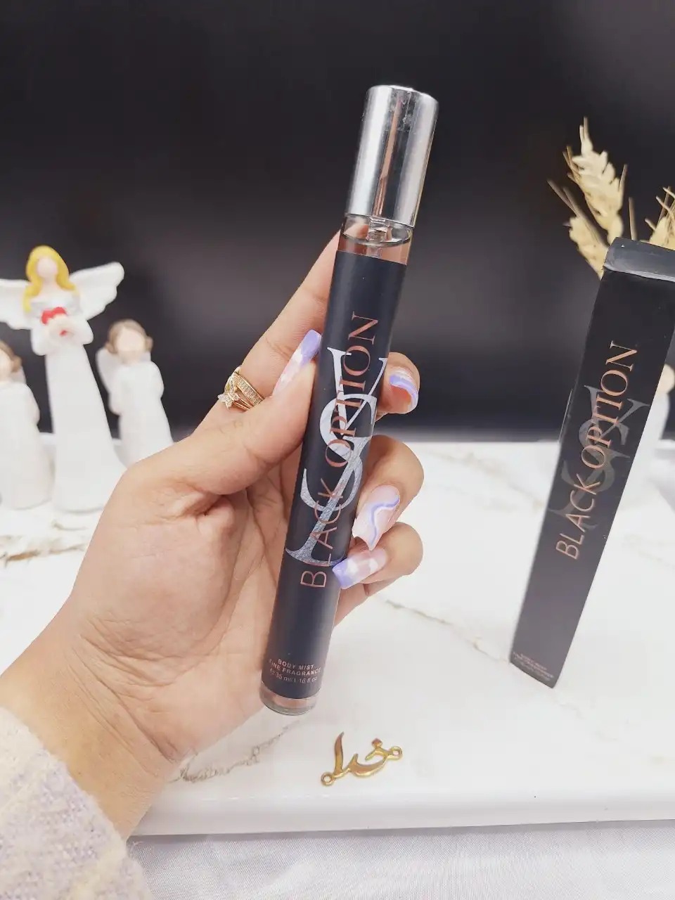 ادکلن استوانه ی 35ml BLACK OPTION کد 1363