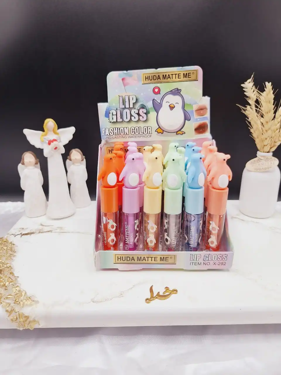 لیپ گلاس طرح پنگوئن هدا مات می HUDA MATTE ME کد X_292