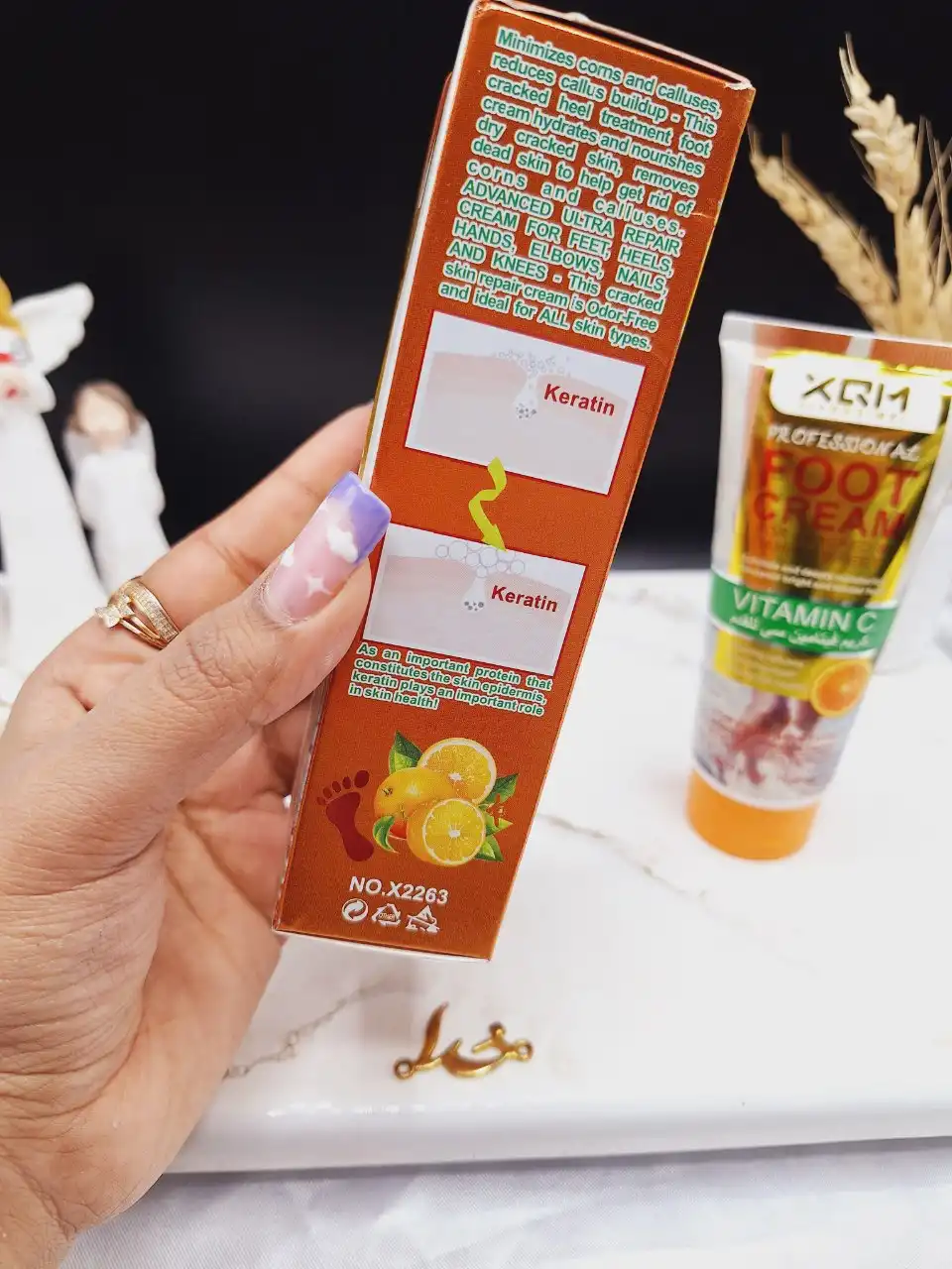 کرم ترک پا لایه بردار و مرطوب کننده ویتامین سی XQM کد X 2263