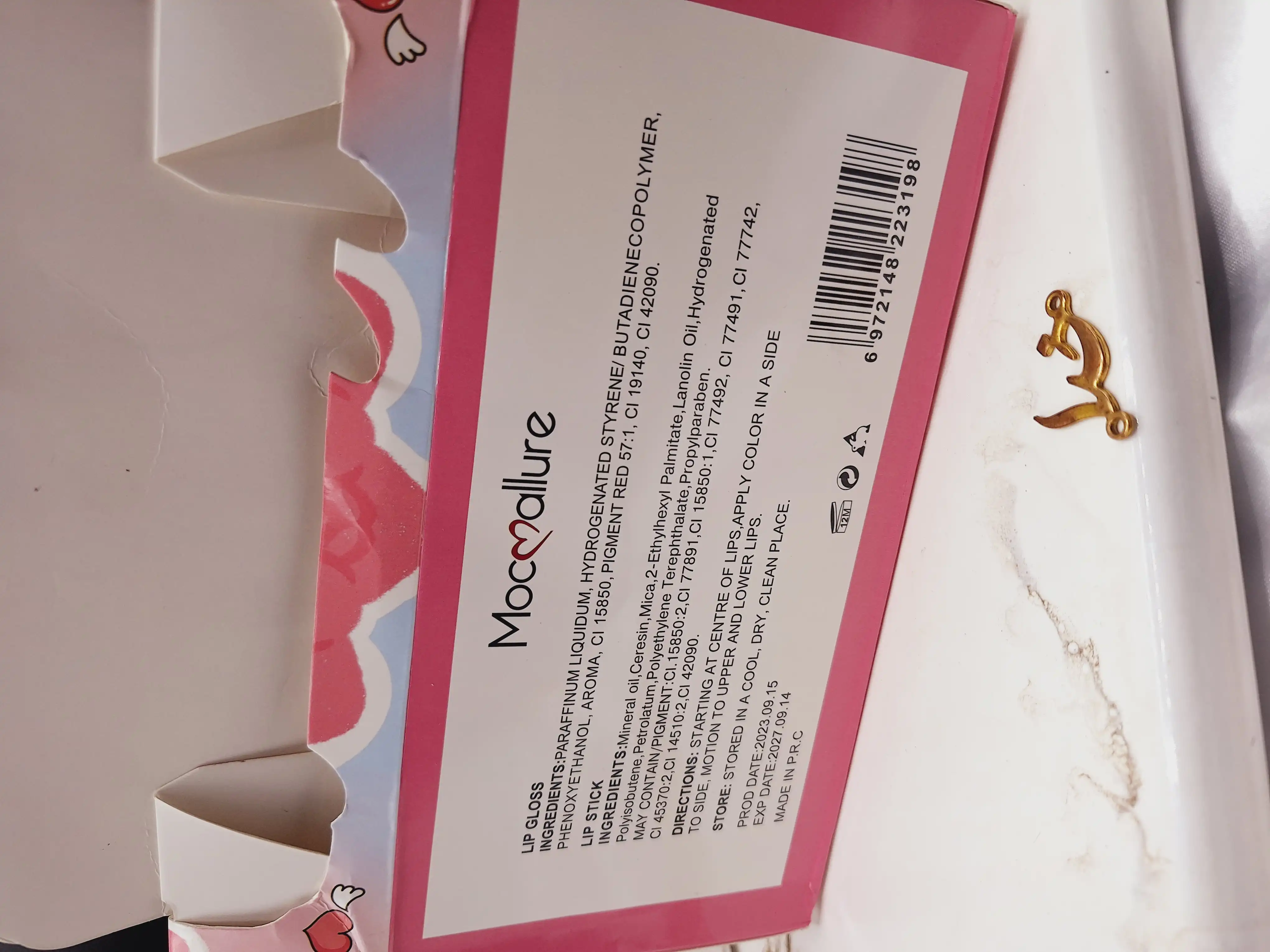 لیپ گلاس و بالم لب همراه با کش مو فانتزی موکالره Mocallure کد Moc 319