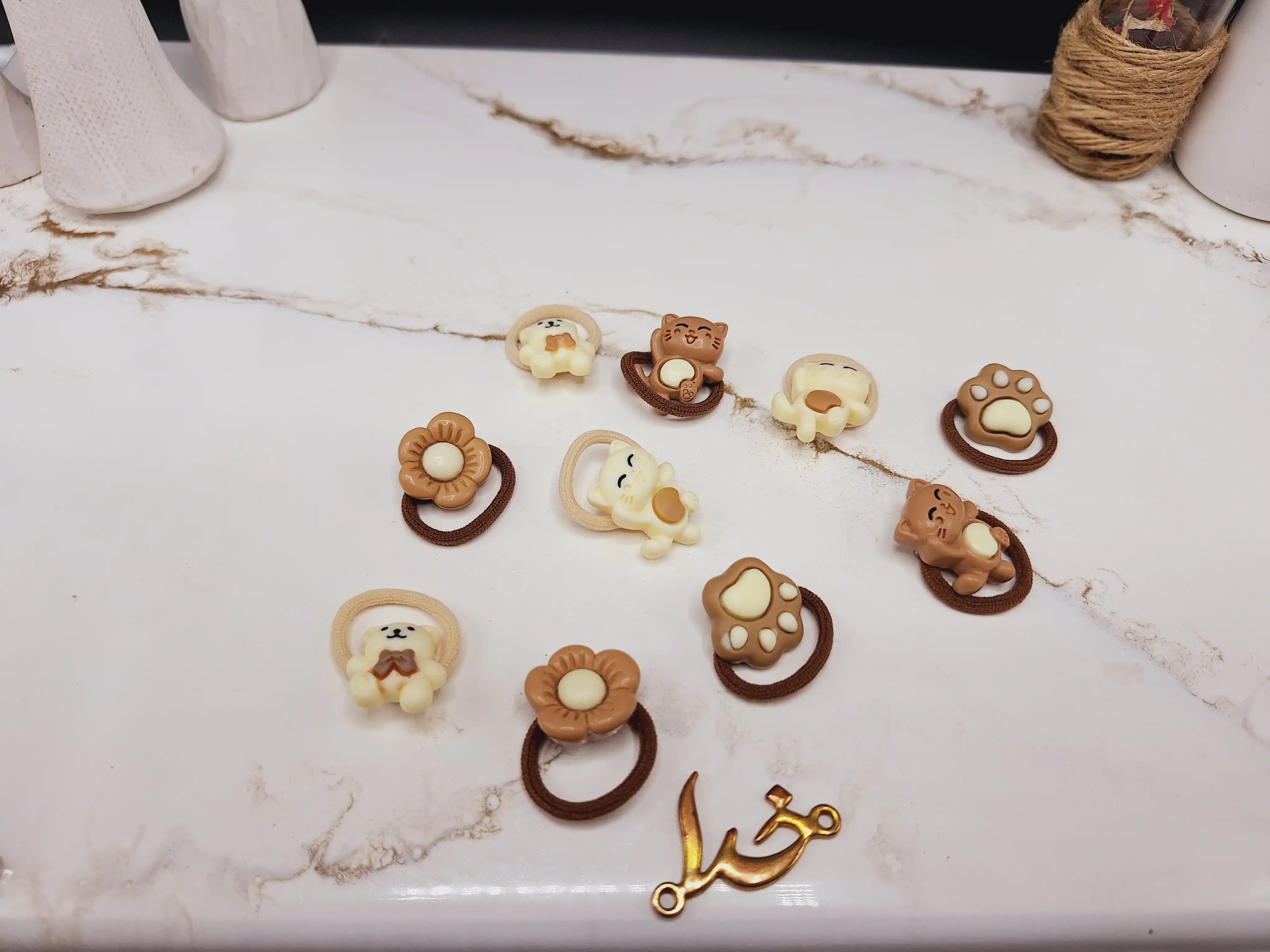 پک کش مو 10 عددی رنگ نود طرح گل و گربه کیوت