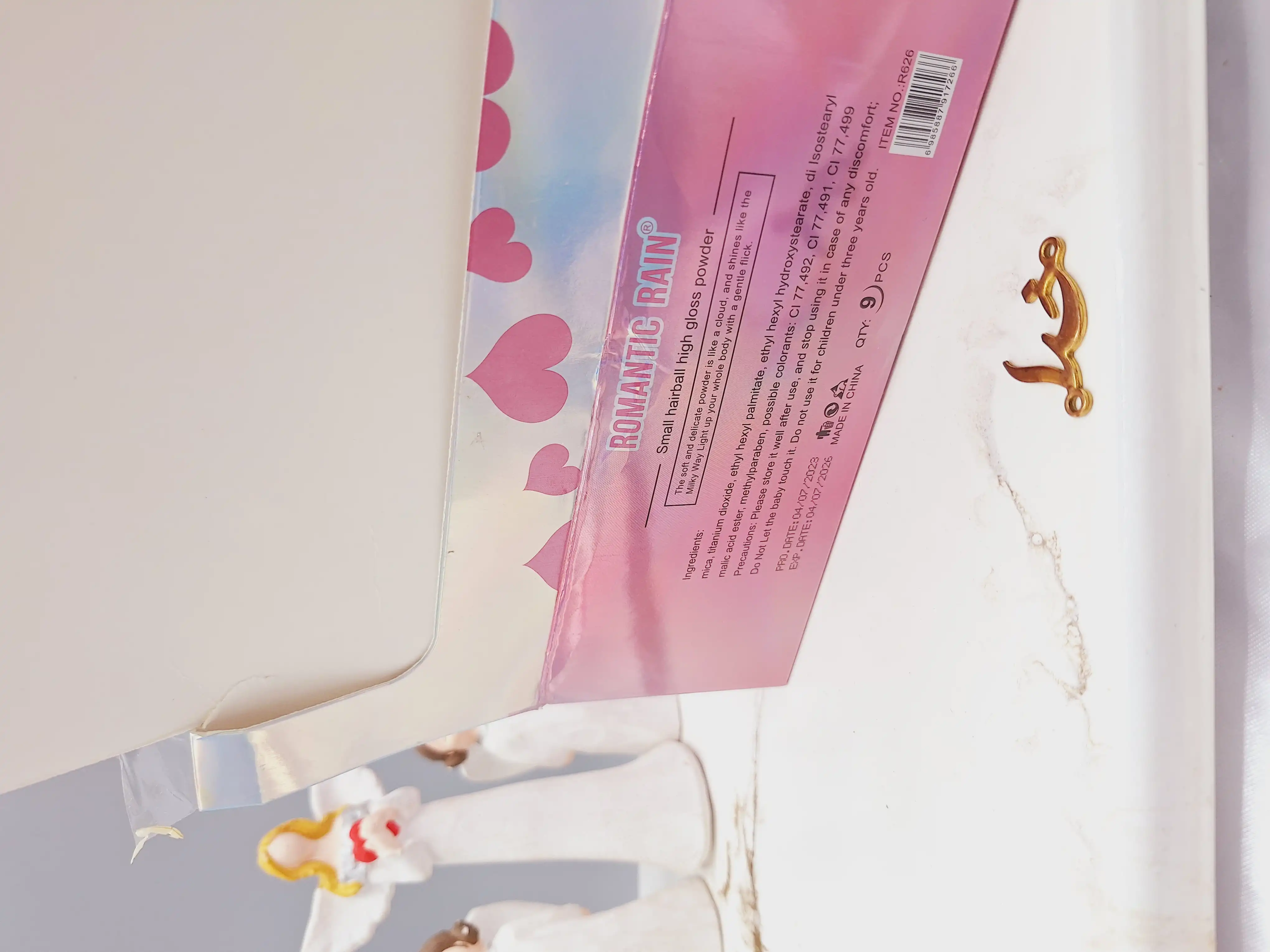 بمب هایلایتر شاین دار پنبه ای برای بدن و صورت برند ROMANTIC RAIN کد R626