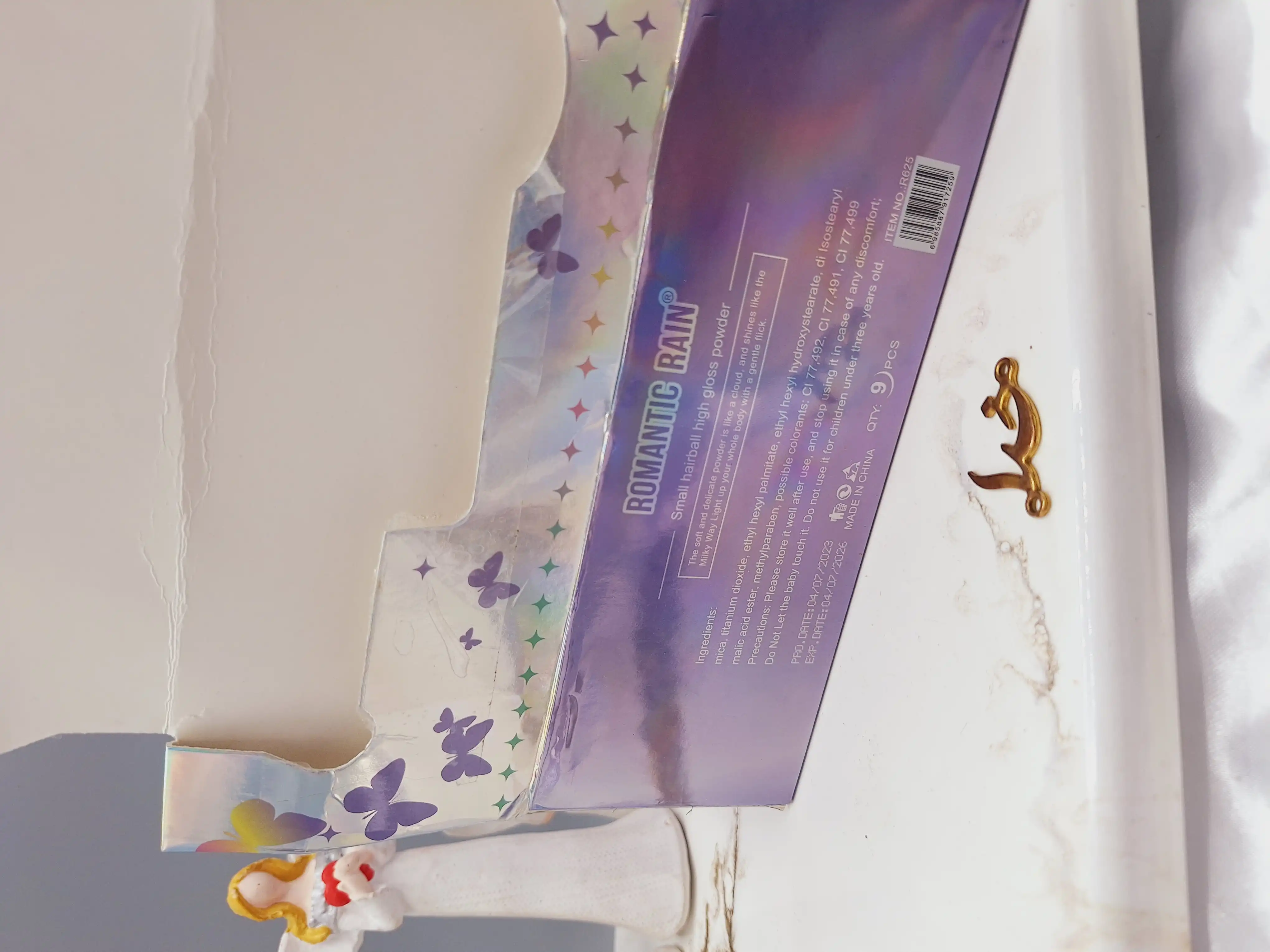 بمب هایلایتر شاین دار پنبه ای برای بدن و صورت برند ROMANTIC RAIN کد R625