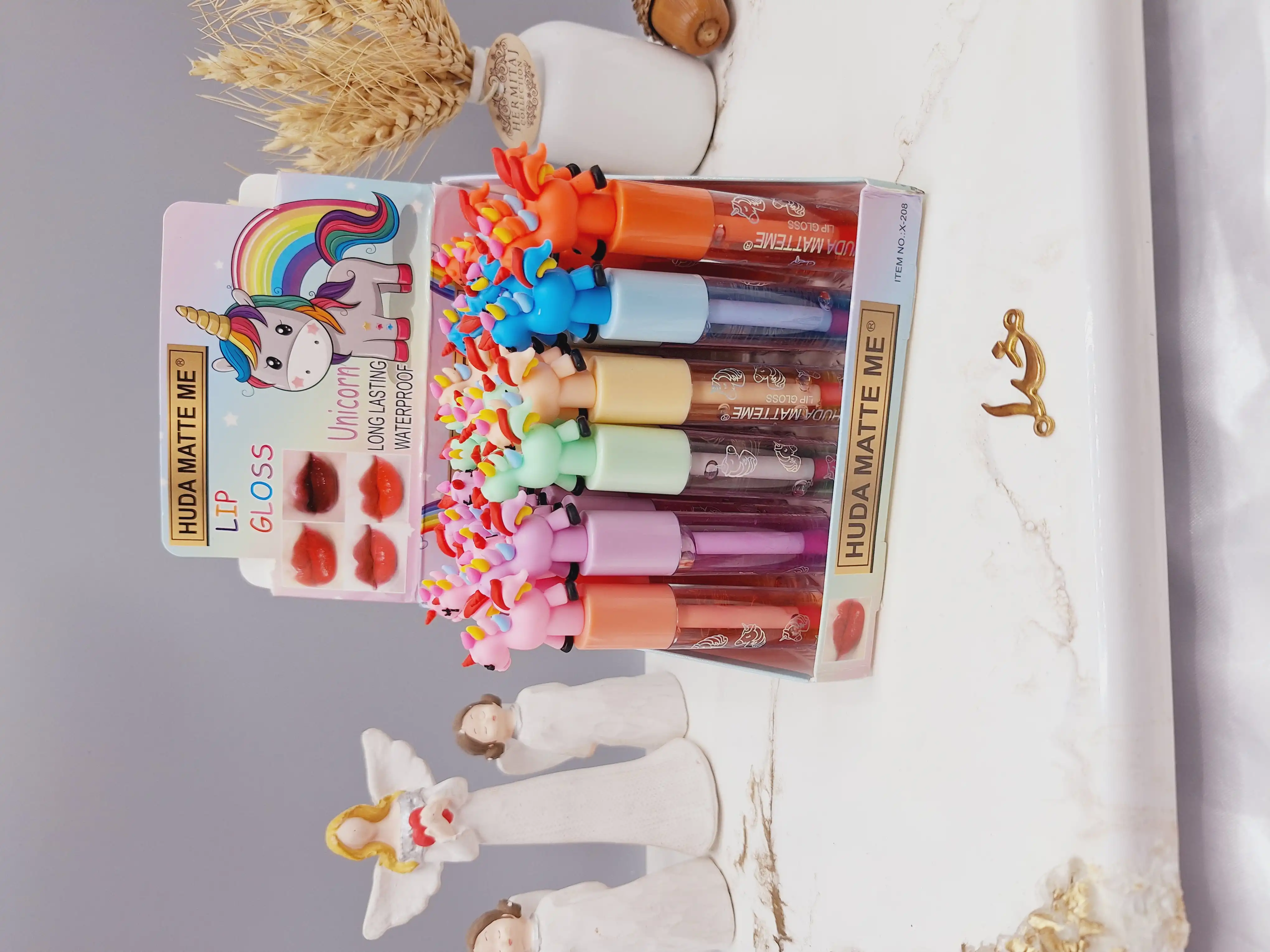 لیپ گلاس طرح اسب تک شاخ رویایی هدا مات می HUDA MATTE ME کد X208