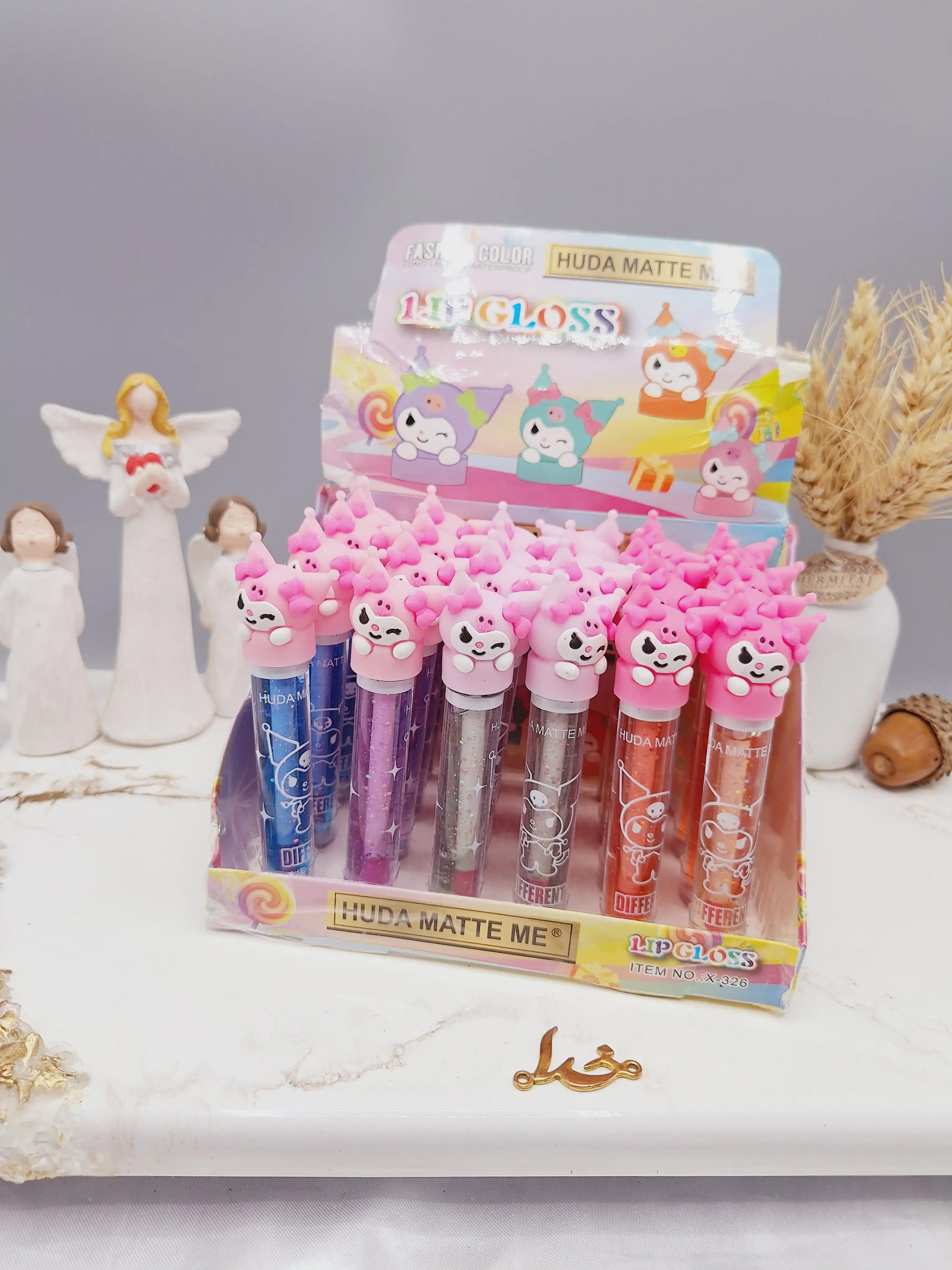 لیپ گلاس شاین دار طرح دلقک بامزه برند هدا مات می HUDA MATTE ME کد X326
