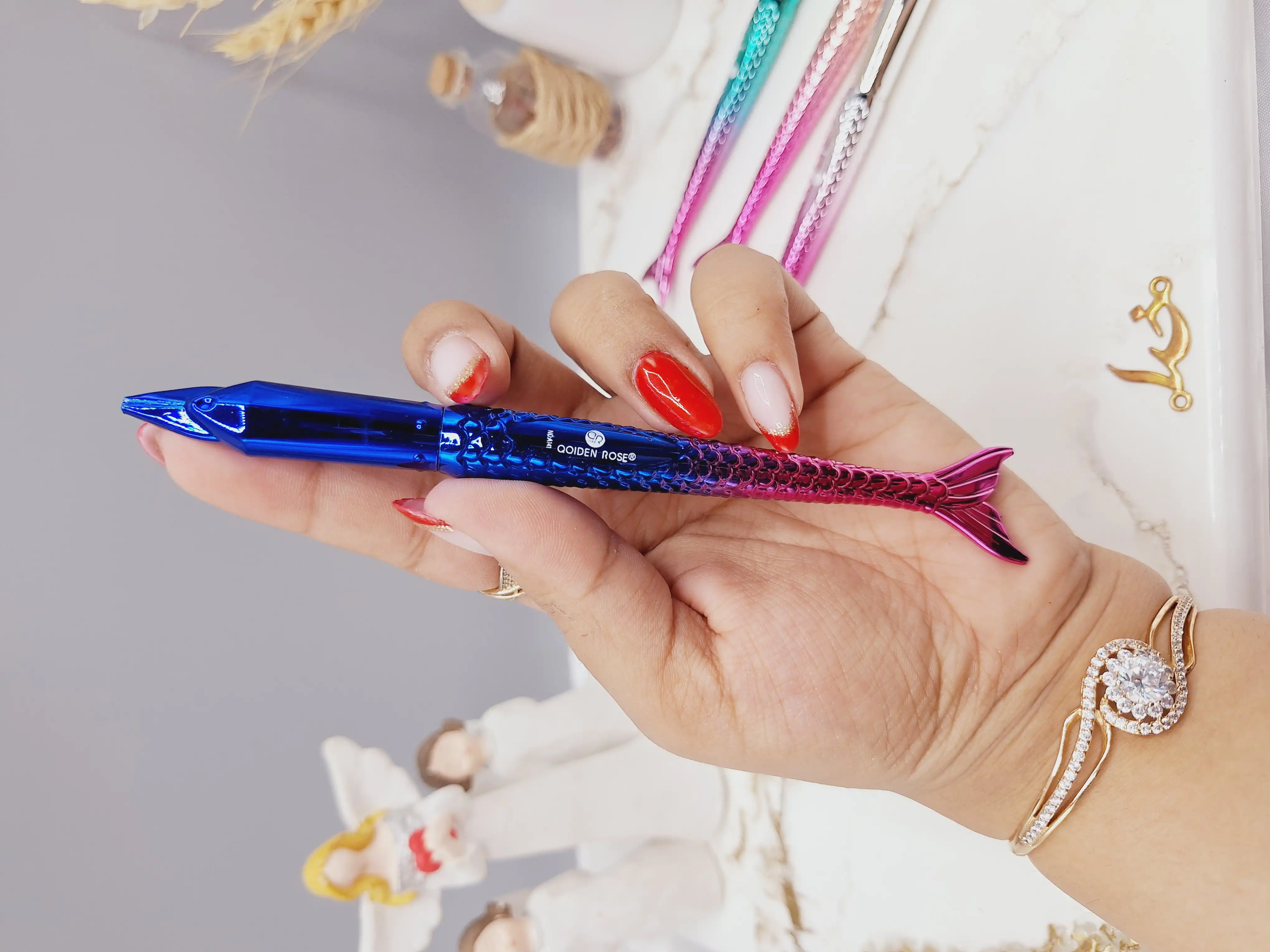 خط چشم ماژیکی طرح پری دریایی برند QOIDEN ROSE کد A141