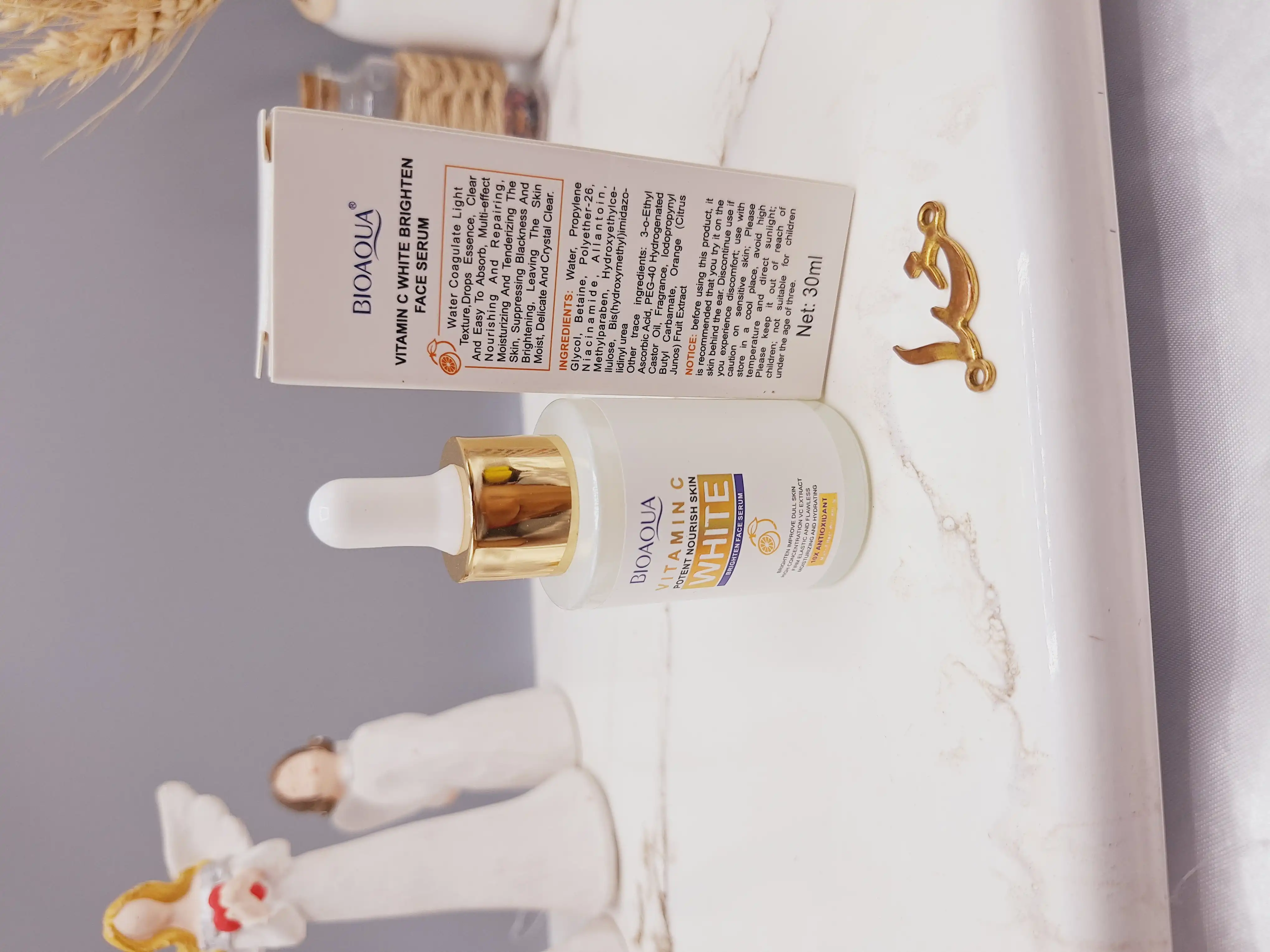 سرم روشن کننده قوی پوست حاوی ویتامین سی برند بیوآکوا BIOAQUA کد BQY 88630