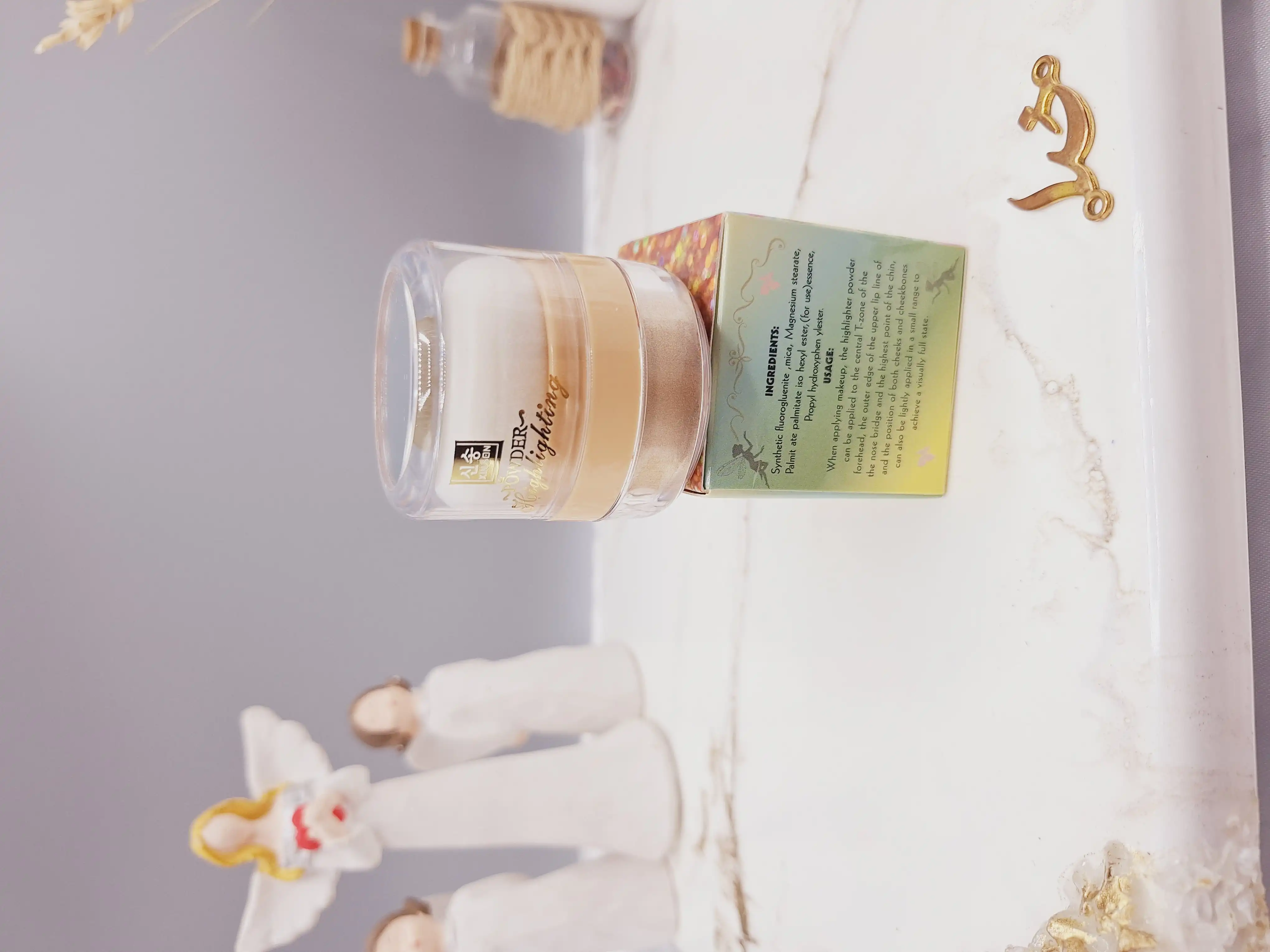 هایلایتر پد دار شاین ریز رنگ طلایی مناسب کل بدن طرح پری برند POWDER کد XS-1096