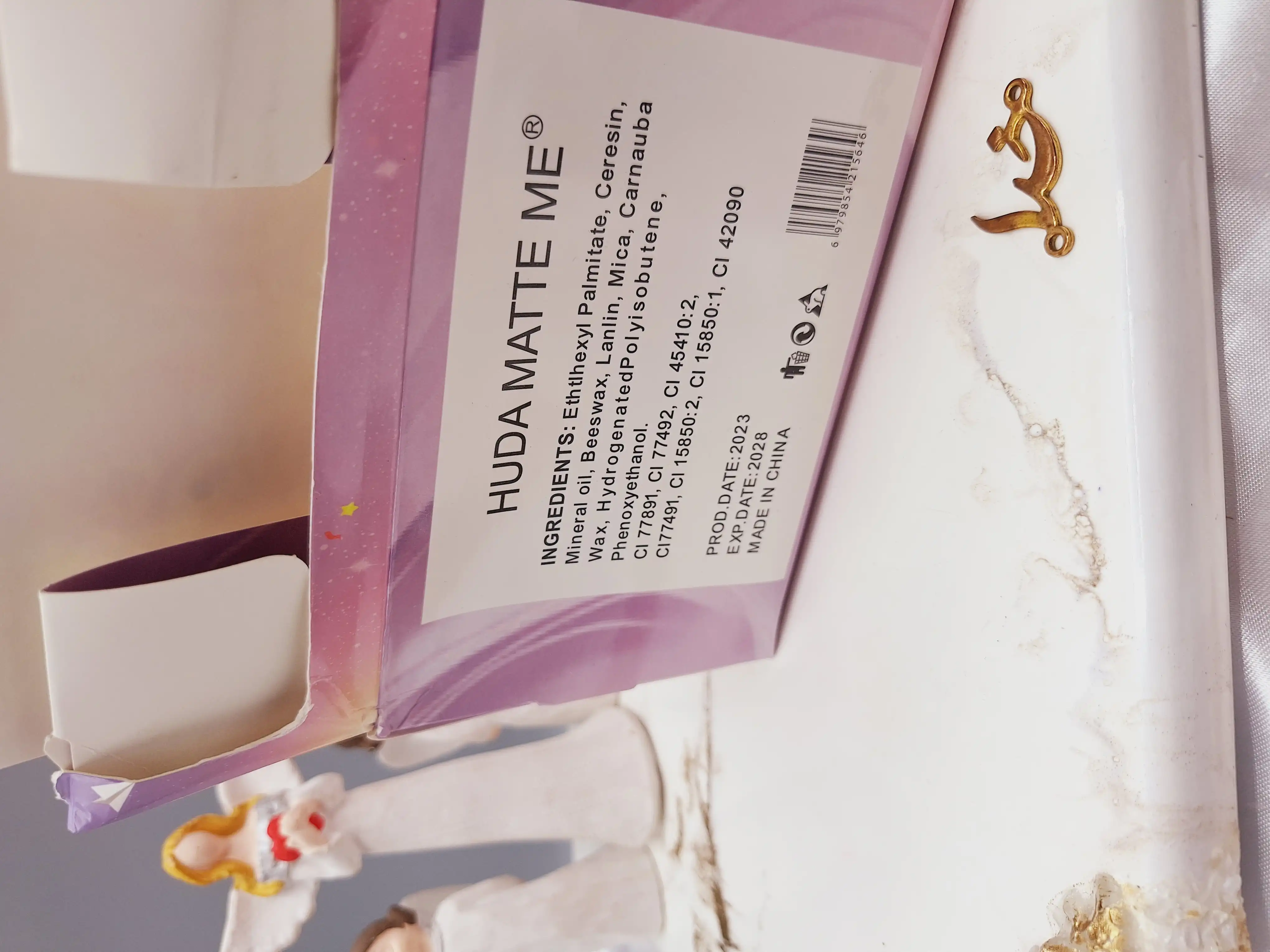 لیپ گلاس شاین دار  طرح فانتزی برند هدا مات می HUDA MATTE ME کد X-358