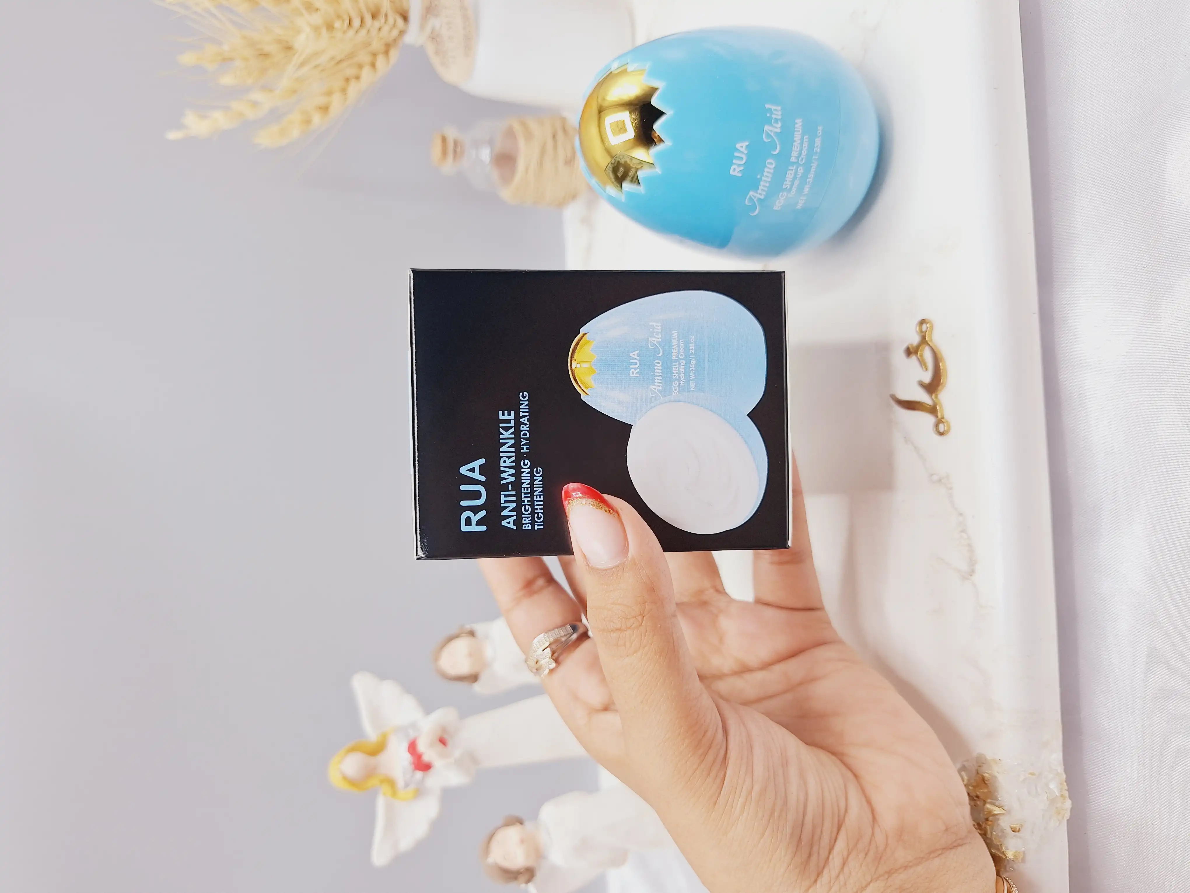 کرم ضد چروک و آبرسان پوست مدل تخم مرغی آبی برند RUA کد 60367