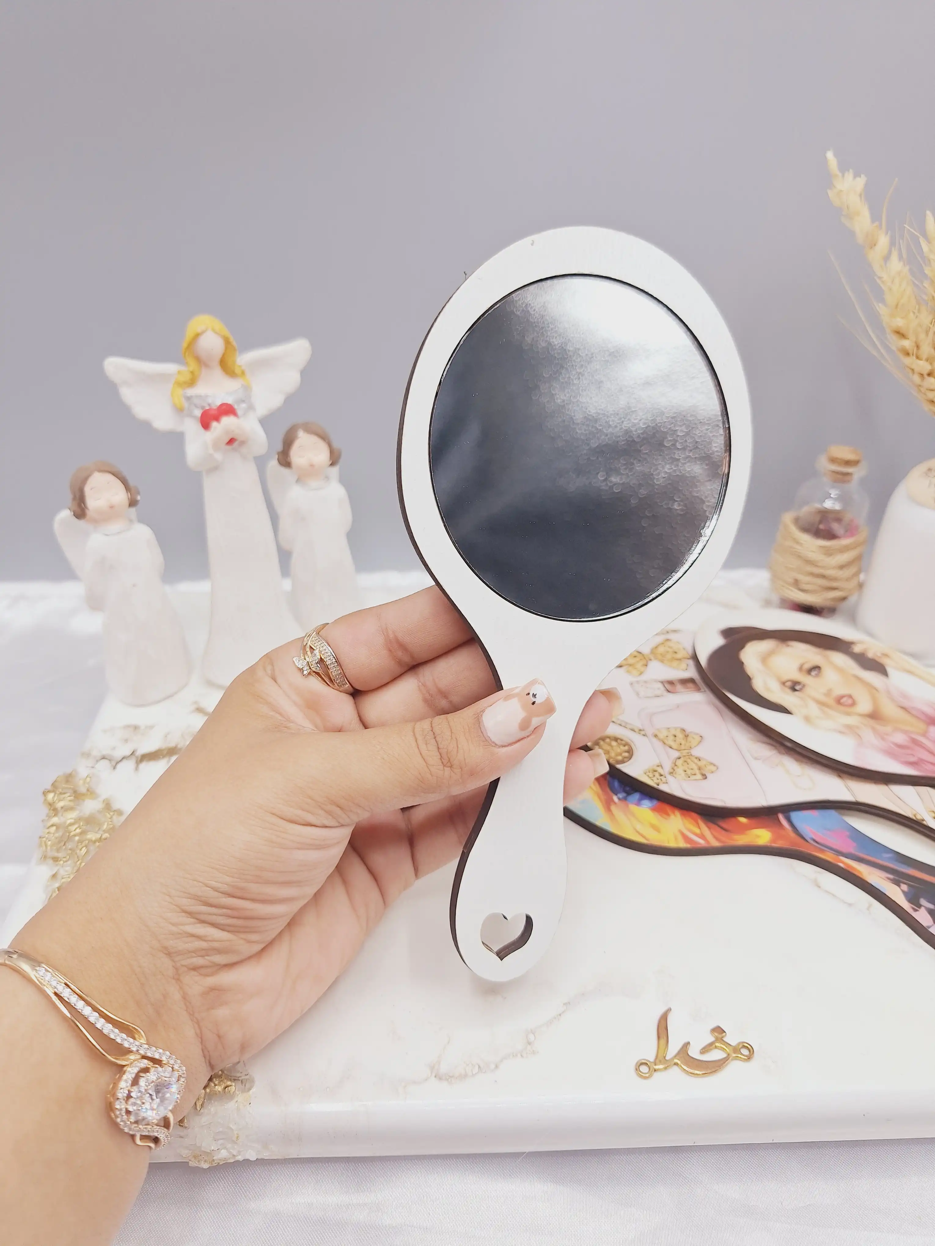 آینه چوبی دسته دار طرح دایره ساده