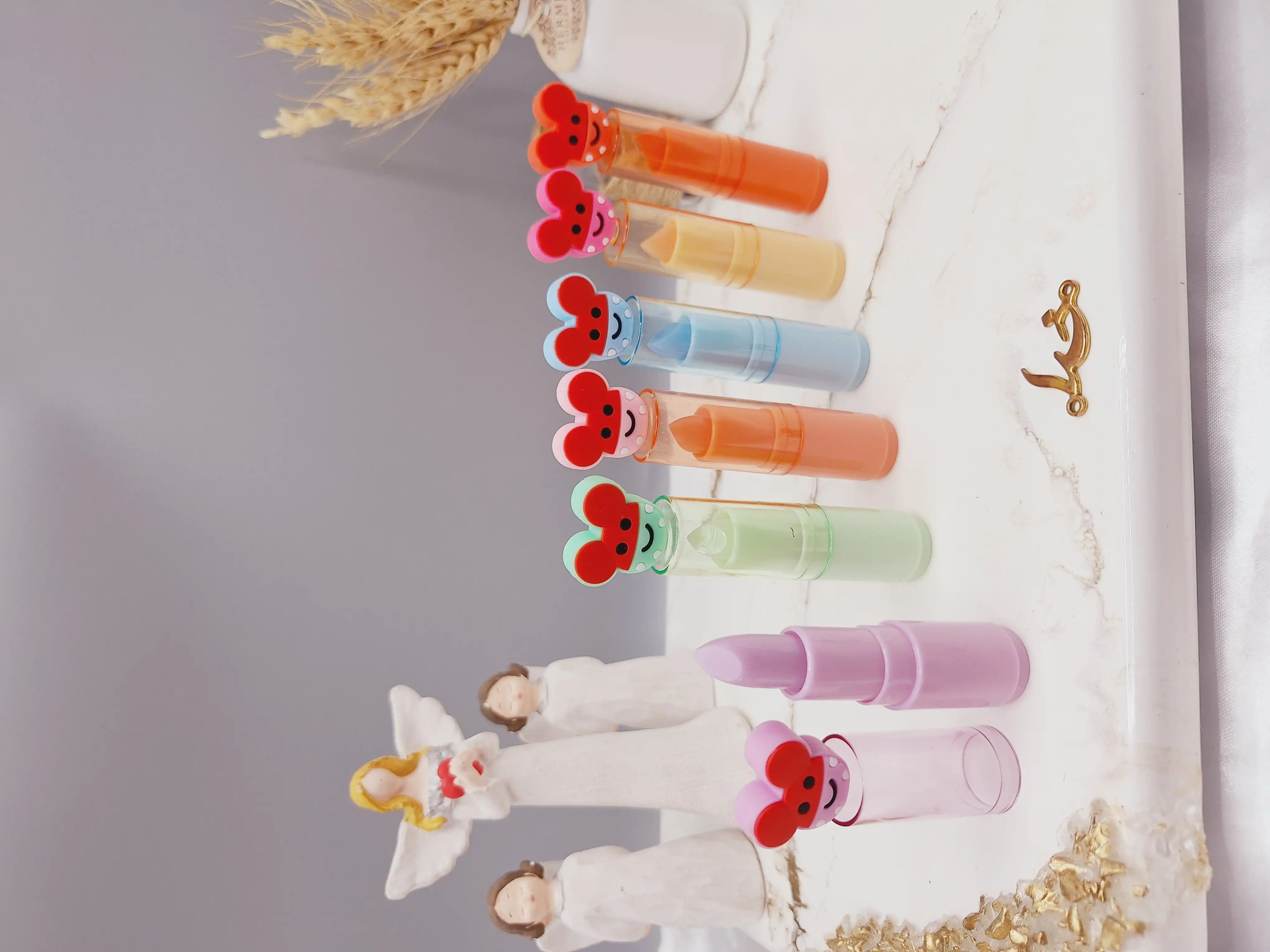 بالم لب خوشبو طرح موش پوکه رنگی برند هدا مات می کد HM_2016