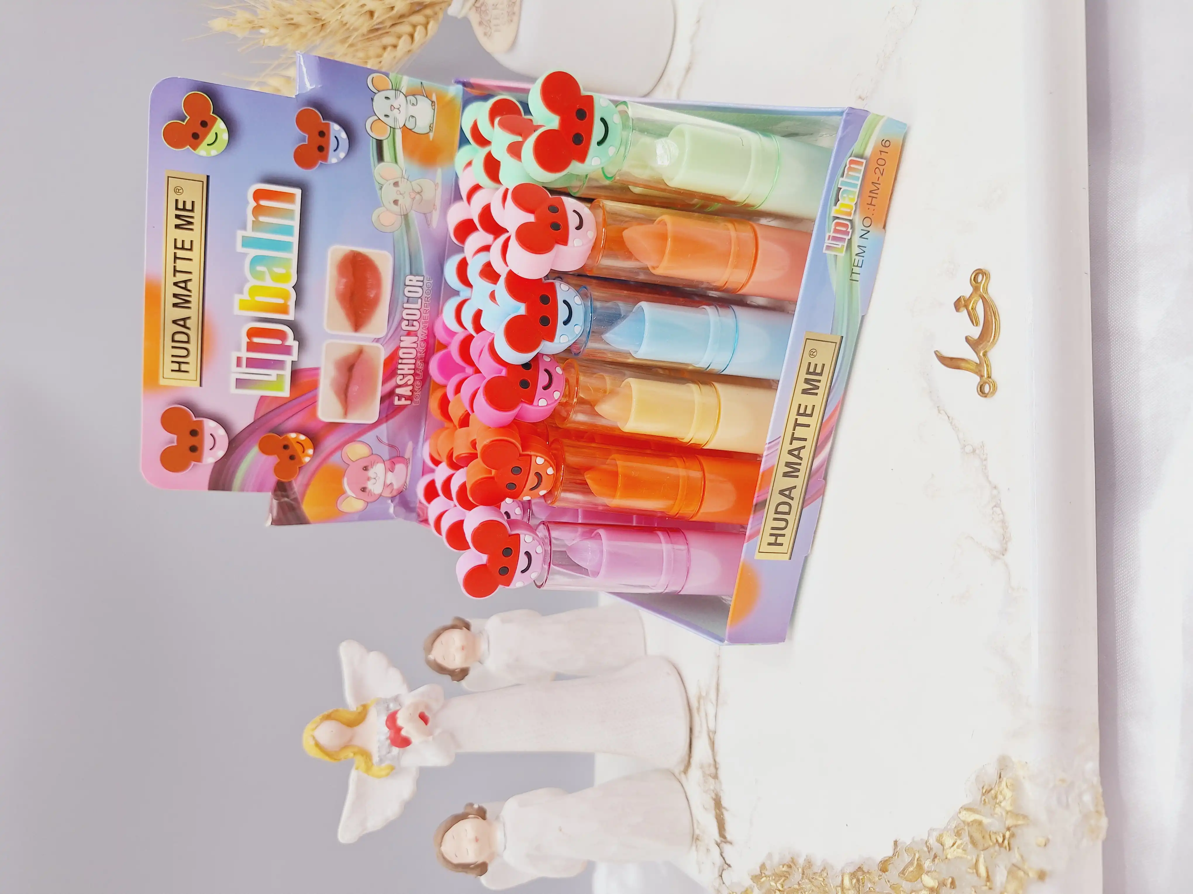 بالم لب خوشبو طرح موش پوکه رنگی برند هدا مات می کد HM_2016