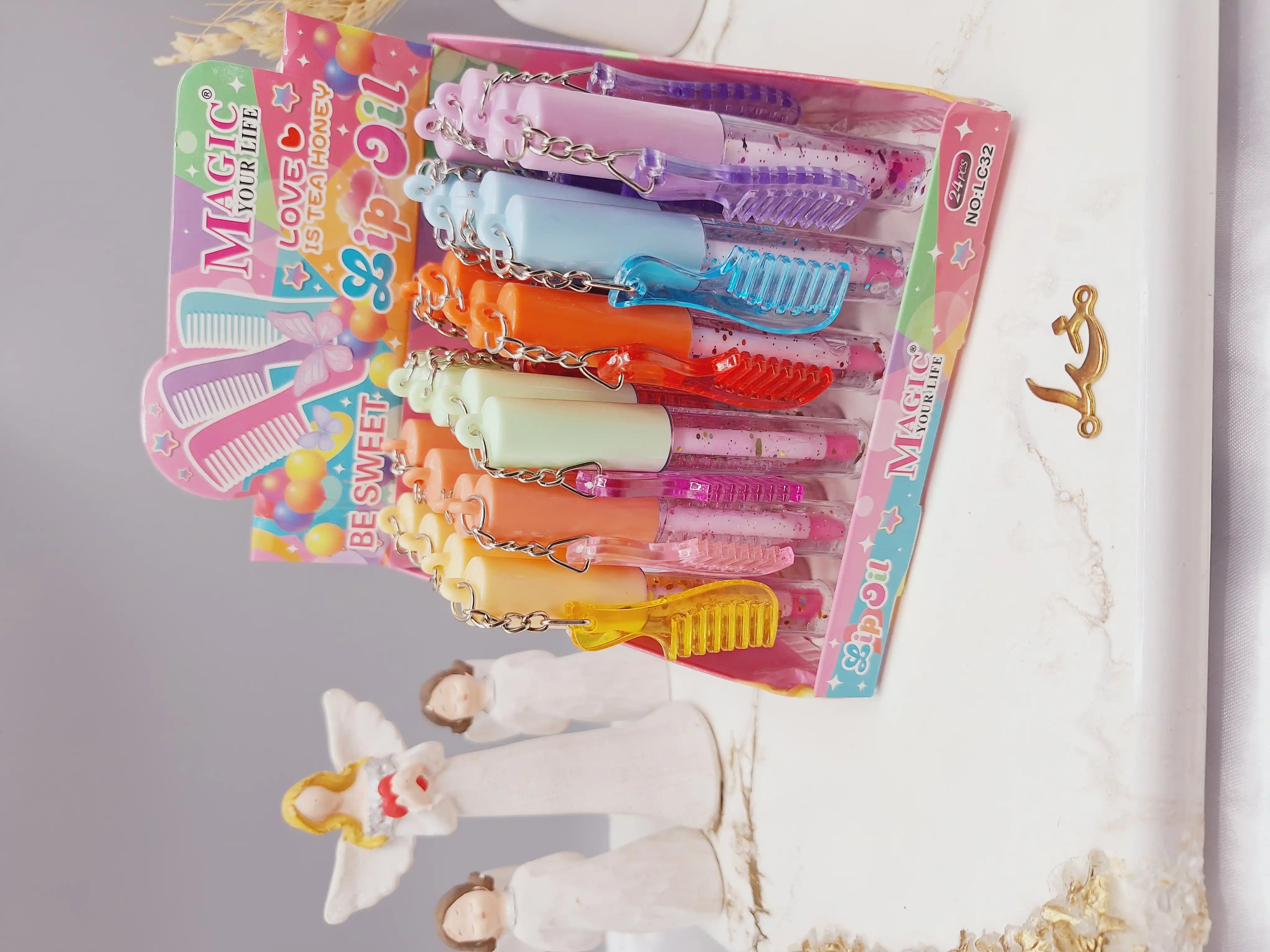 لیپ گلاس گلیتر دار طرح شانه ای برند مجیک کد LC32