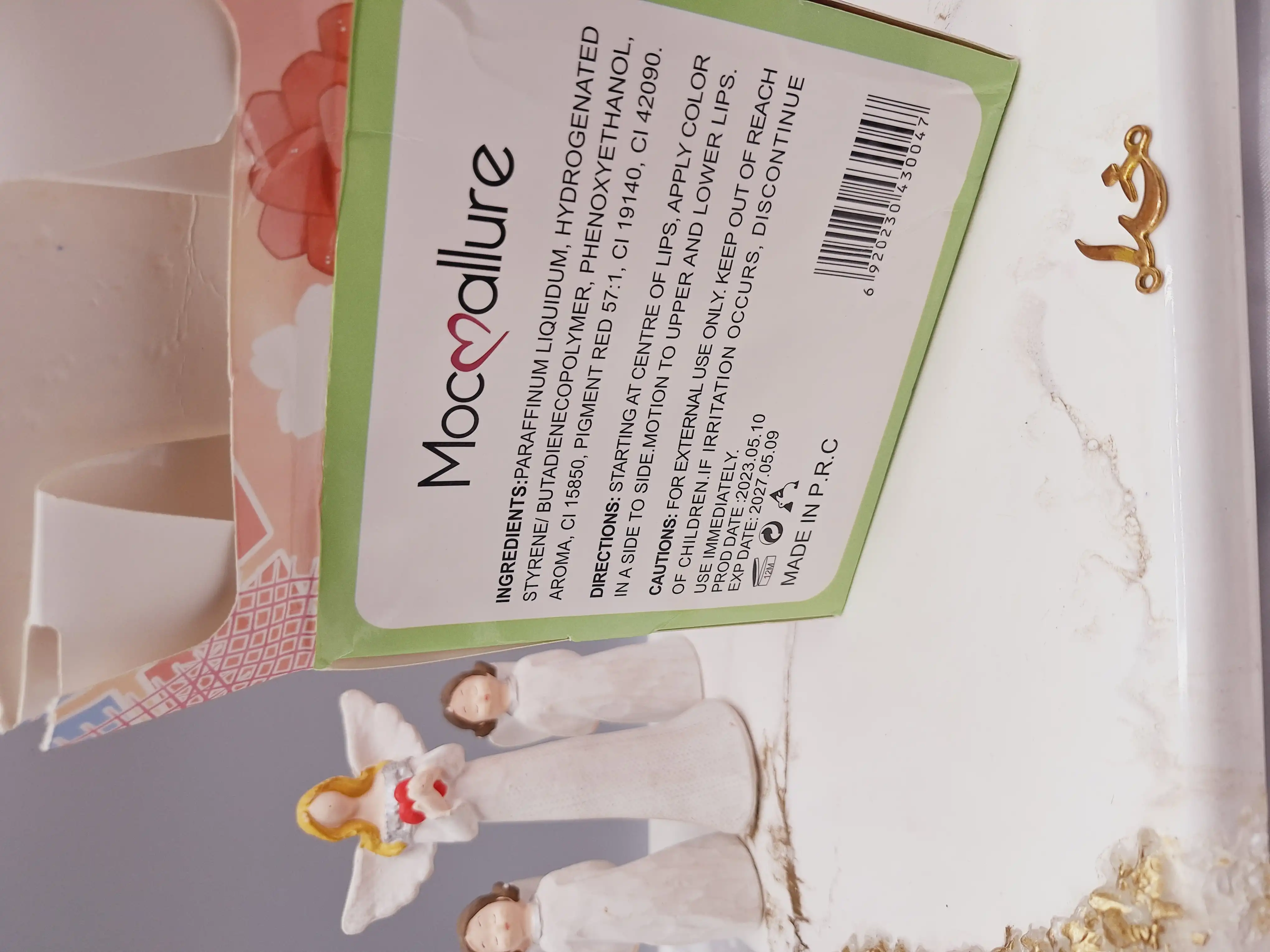 لیپ گلاس شاین دار طرح آویز پاپیون دار برند موکالره کد Moc118