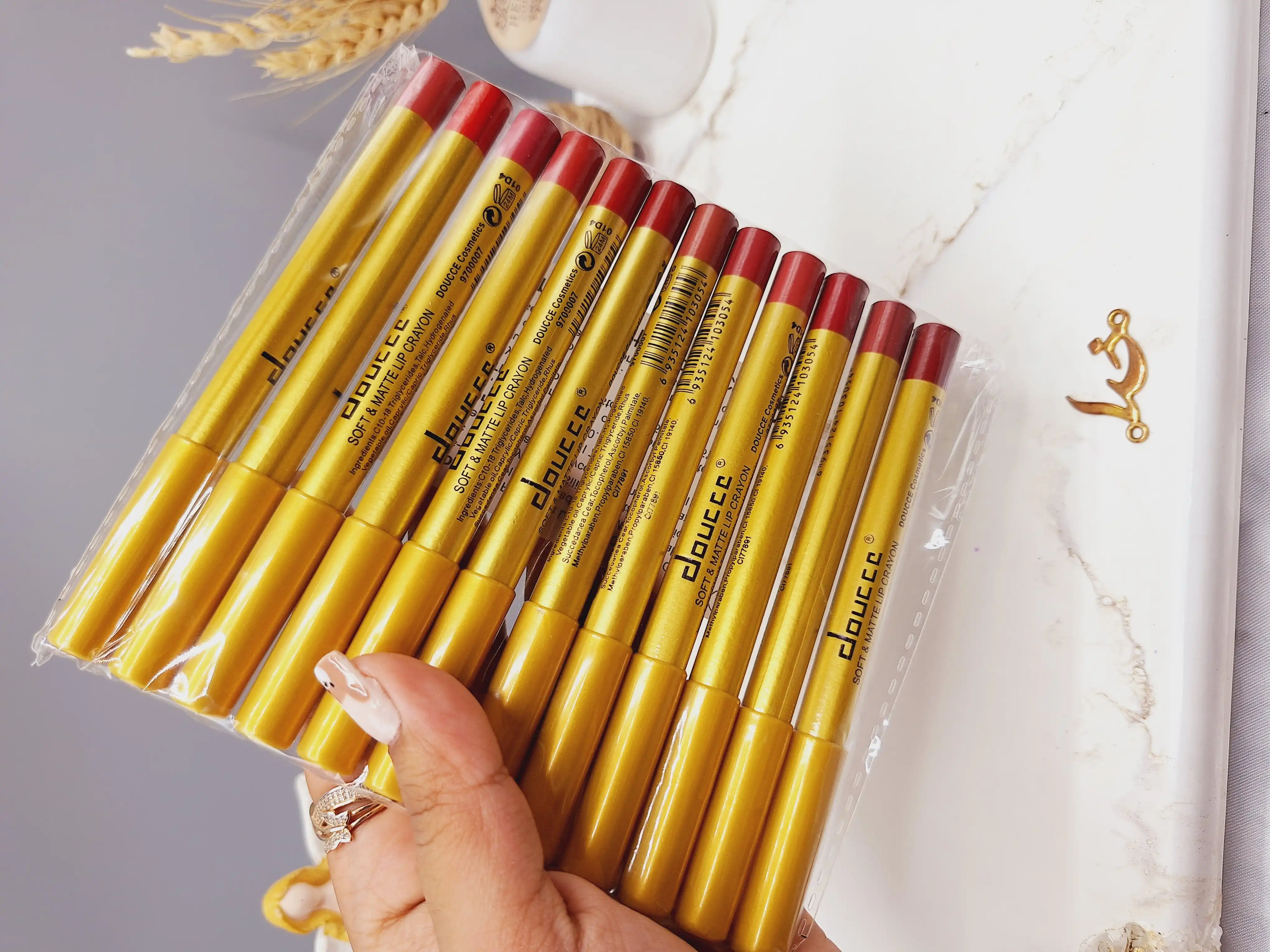 پک 12 تایی رژ مدادی برند دوسه doucce پوکه طلایی کد A