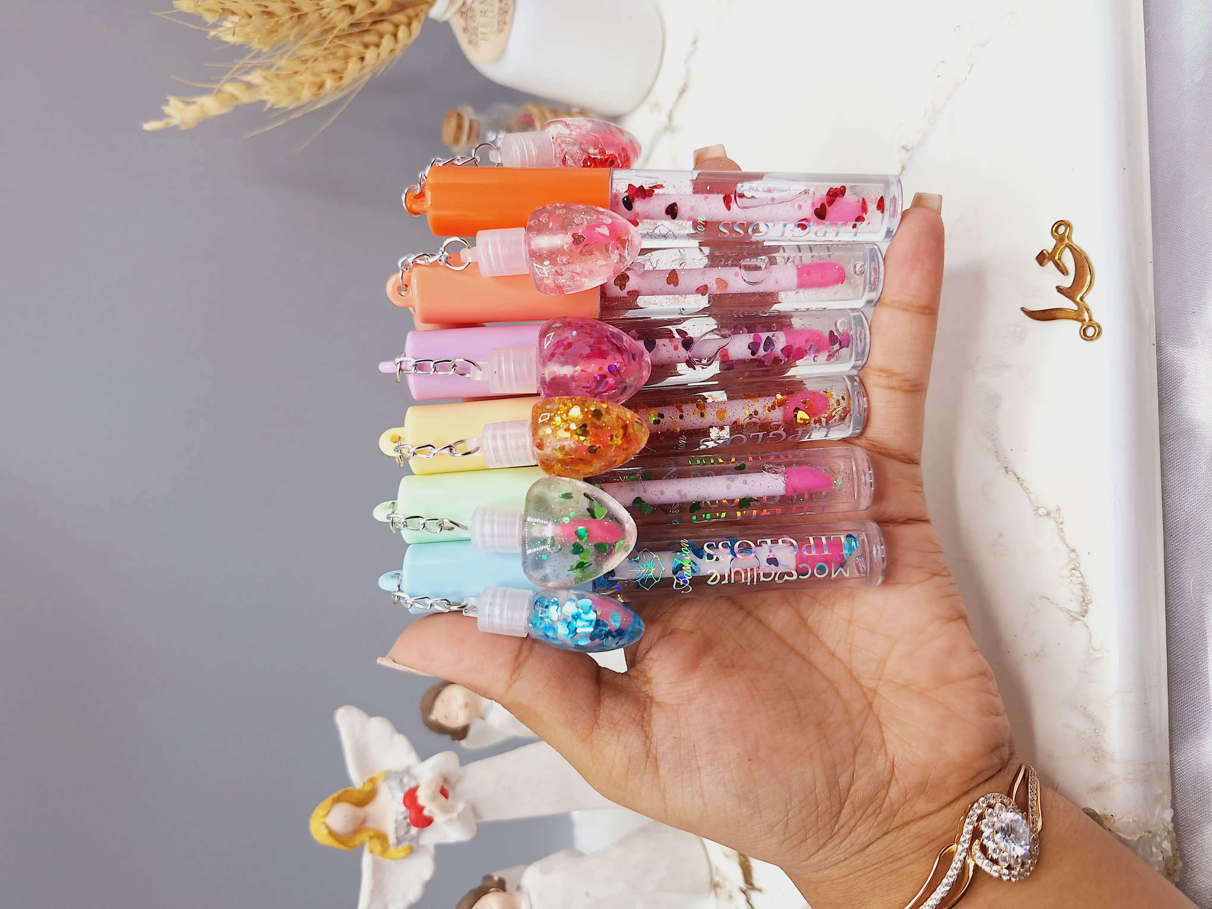 ست 2 تایی لیپ گلاس گلیتری طرح قلب برند موکالره Mocallure کد 125