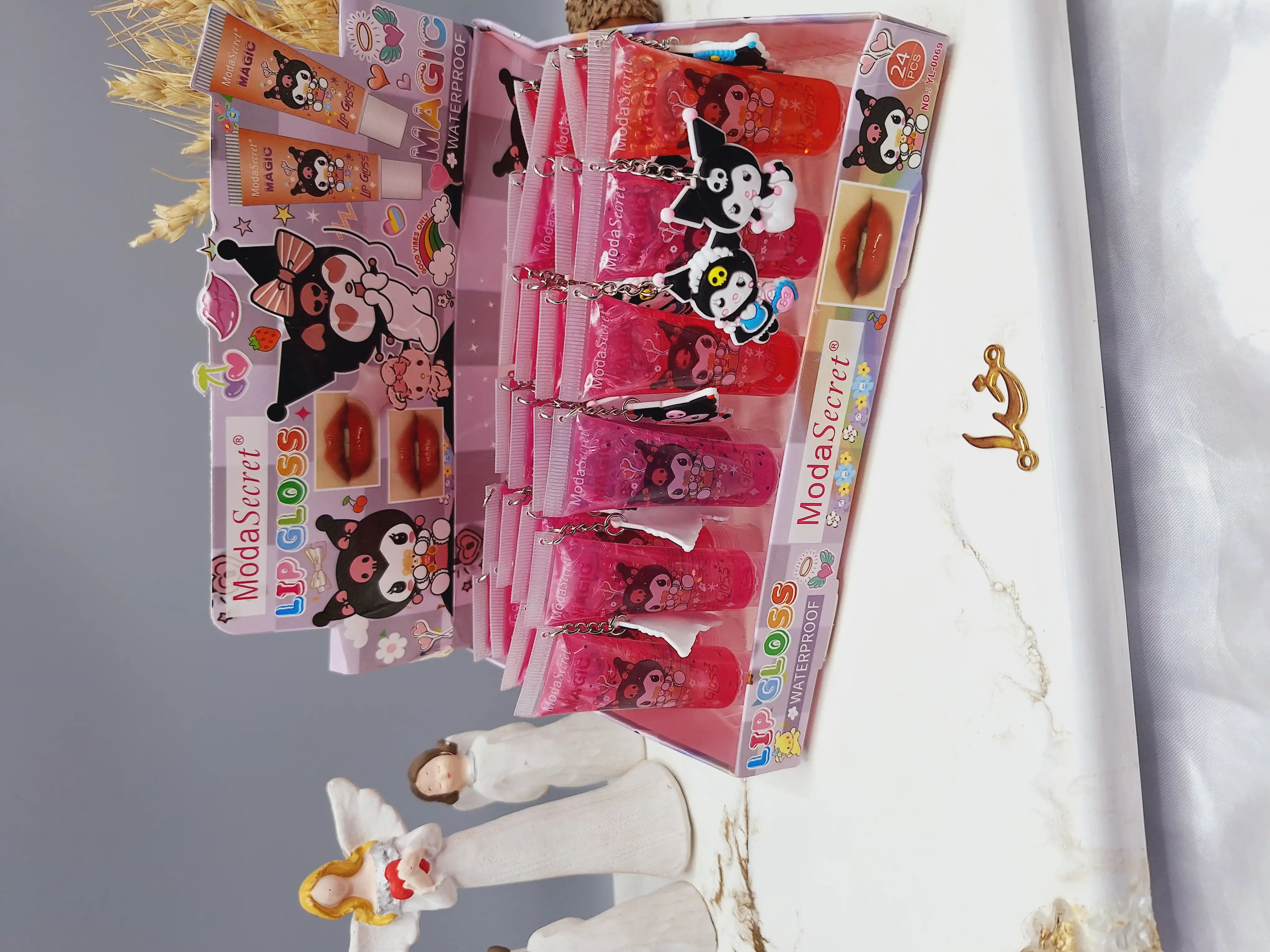 لیپ گلاس گیلیتری آویز دار طرح دلقک کد YL_0069