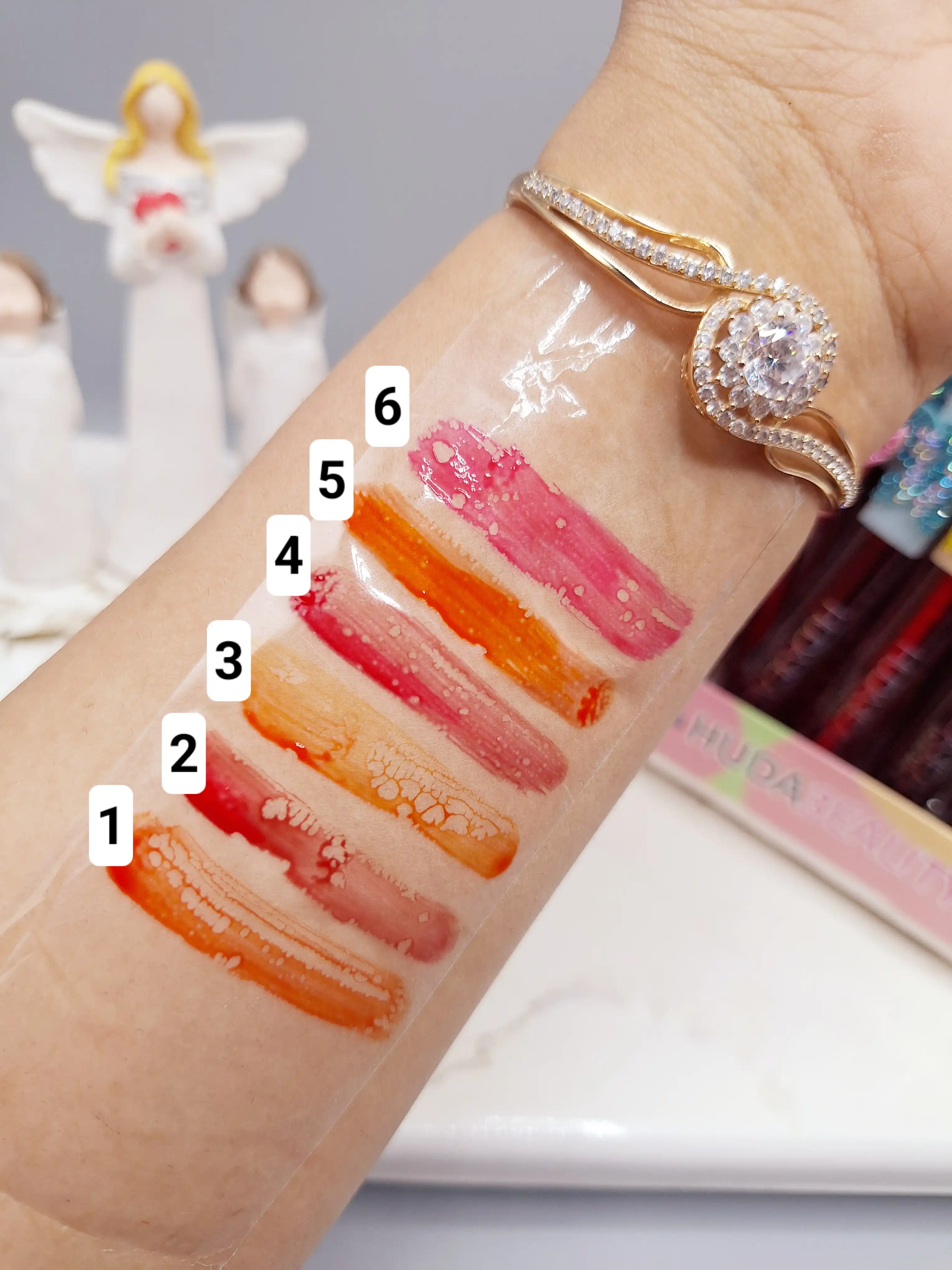 تینت لب پروانه نگینی برند HUDA3EALITY کد 998